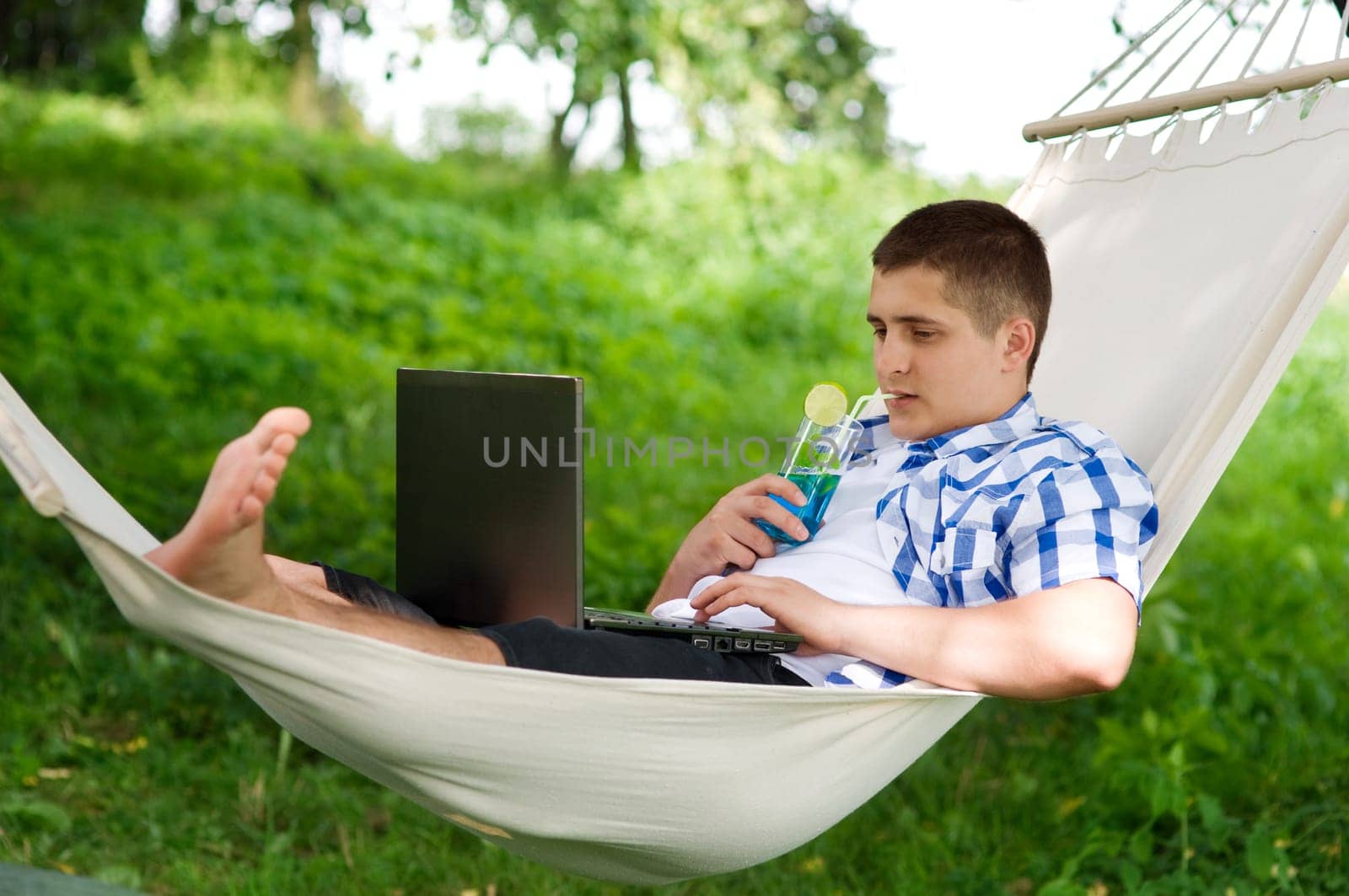 Man relaxing in a hammock