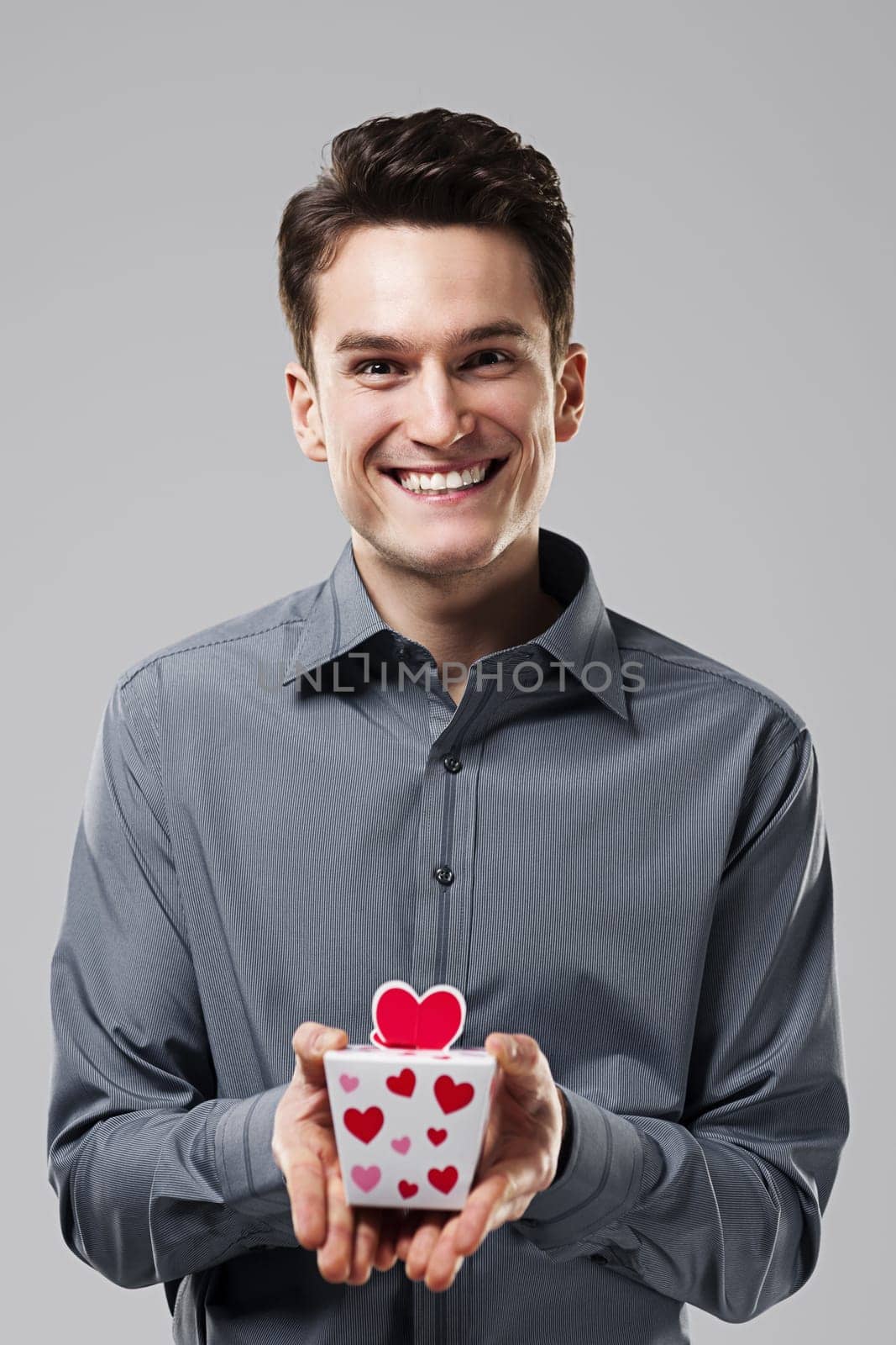 Man holding in his hands the love gift