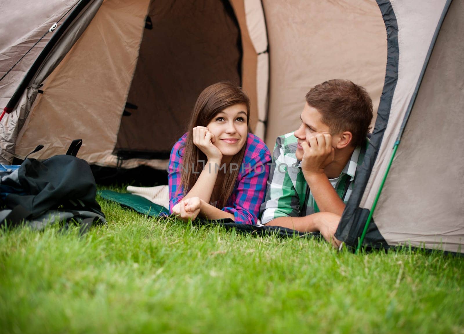 Couple resting in tent