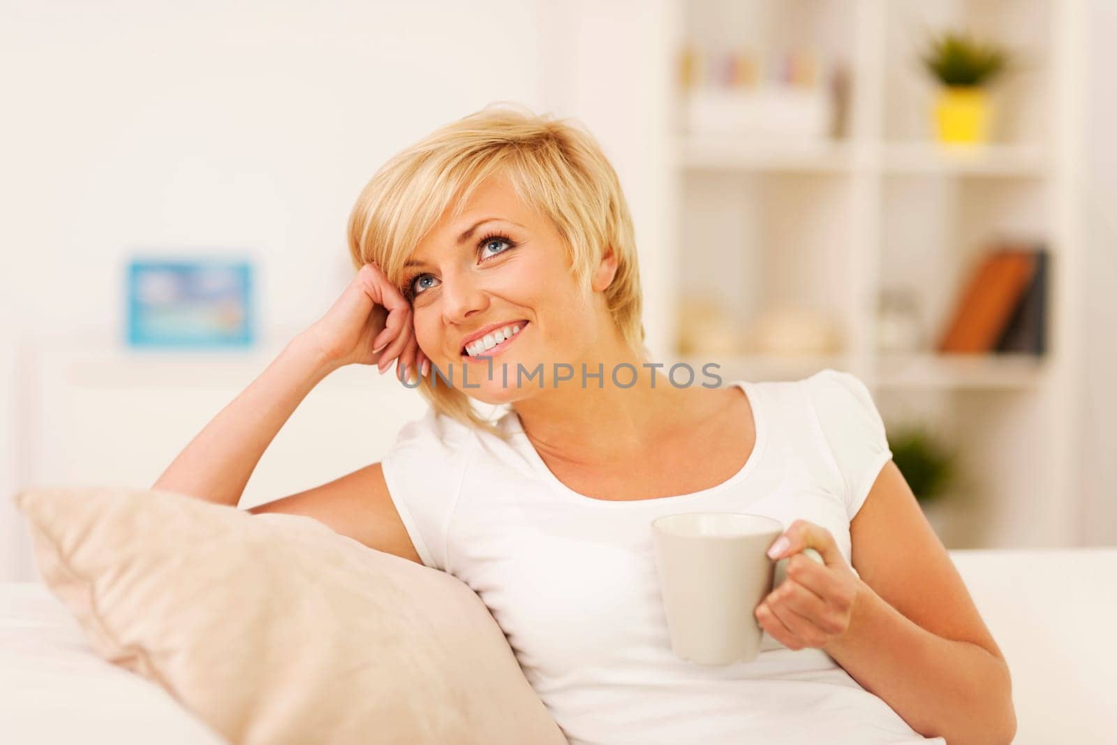 Resting with coffee on couch
