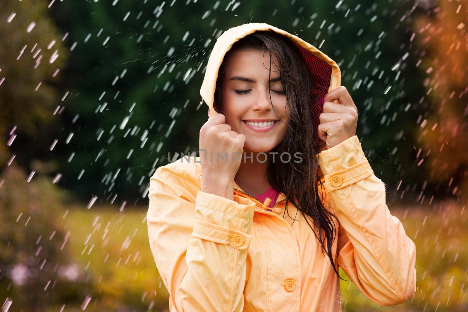 Natural female beauty in autumn rain