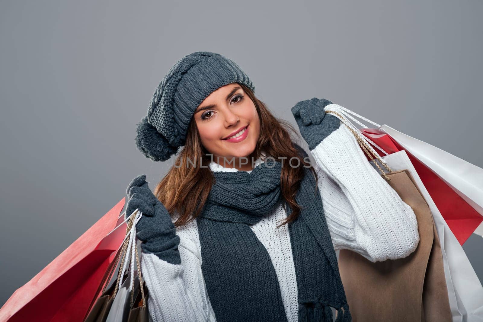 Smiling woman during the winter sale
