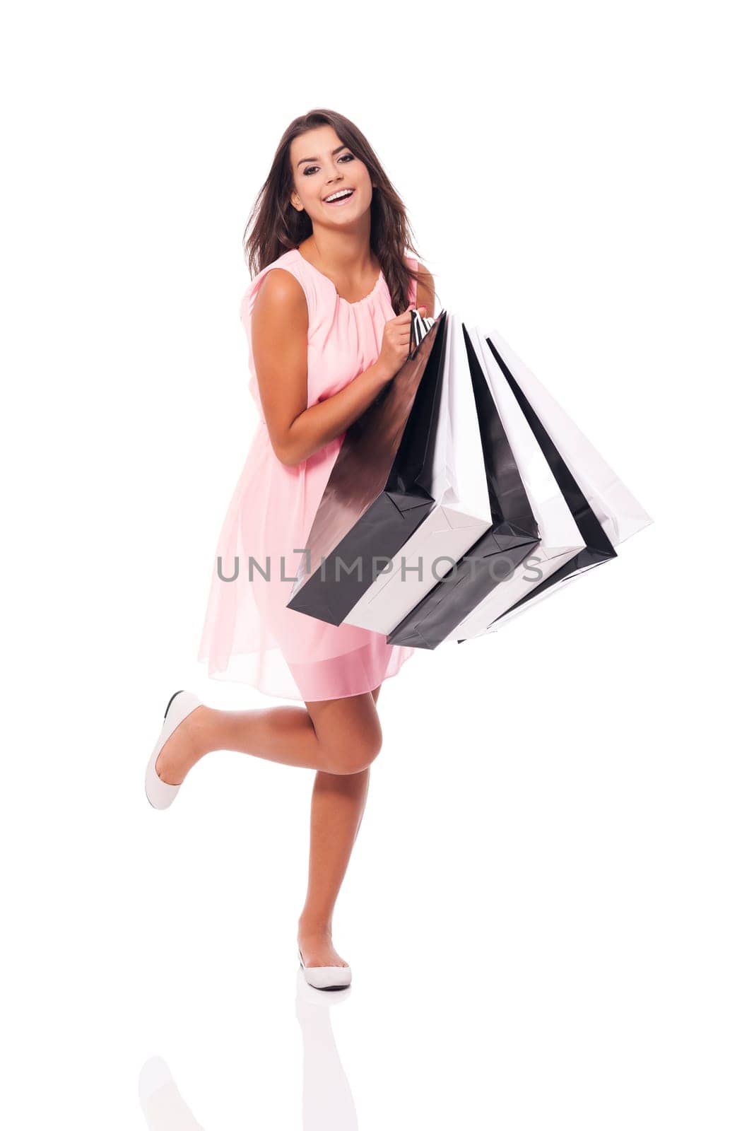 Young woman is satisfied from summer sale
