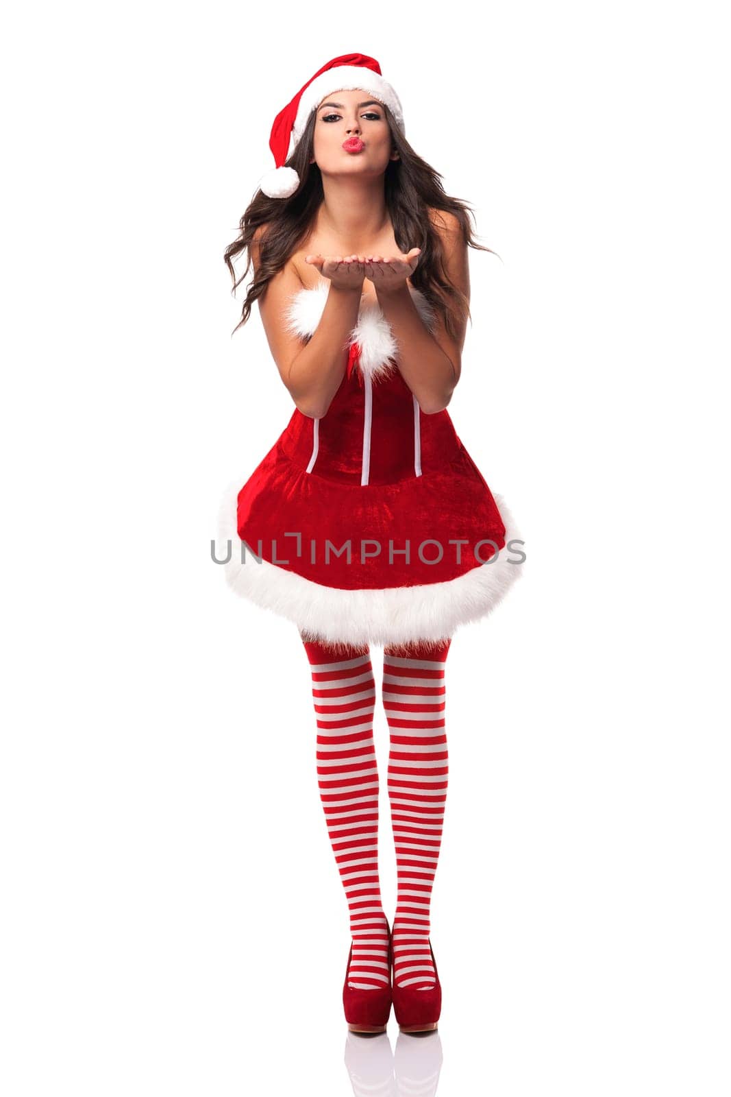 Sexy Mrs santa claus blowing a kiss