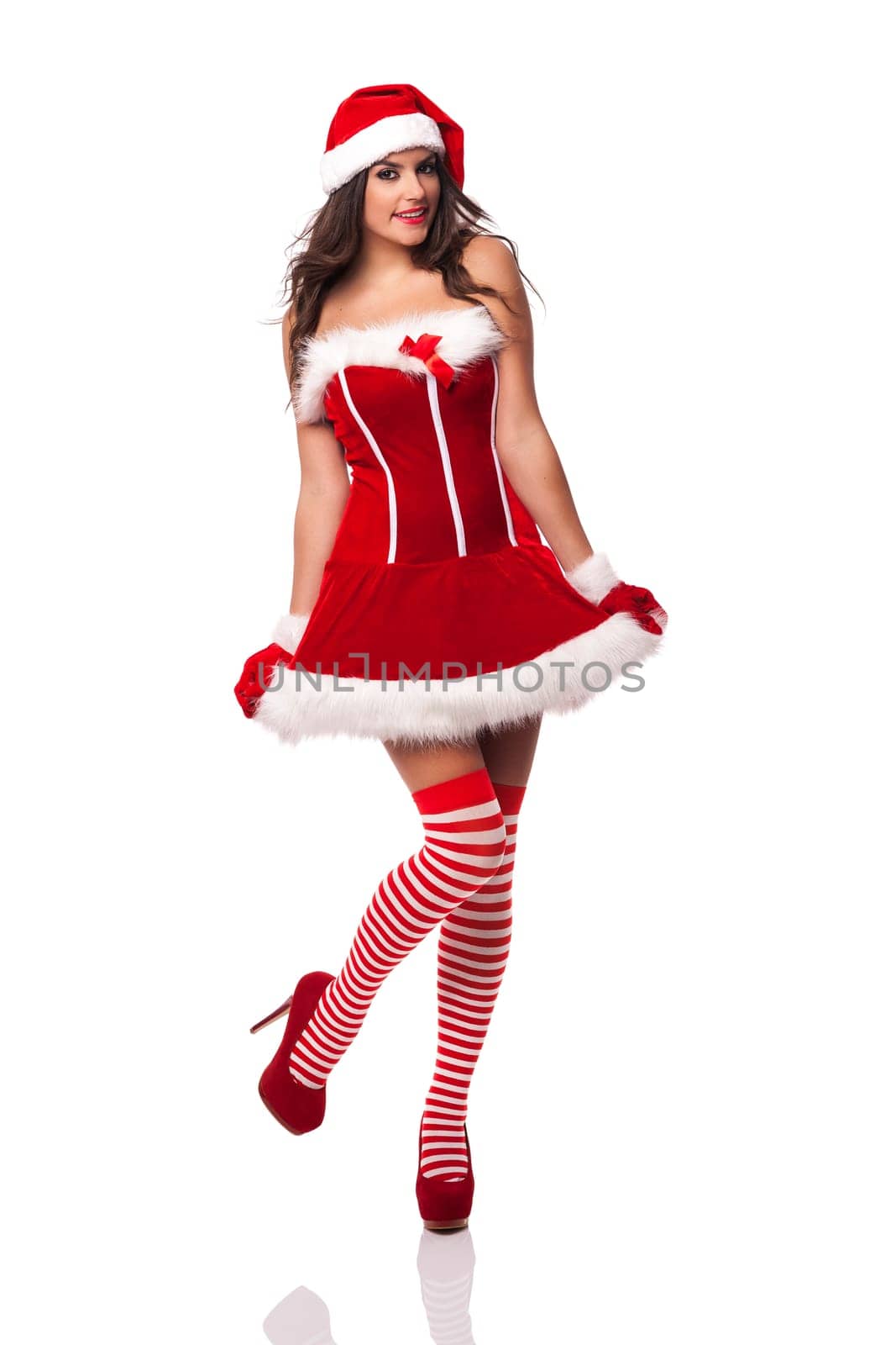 Beautiful sexy woman wearing santa claus clothes
