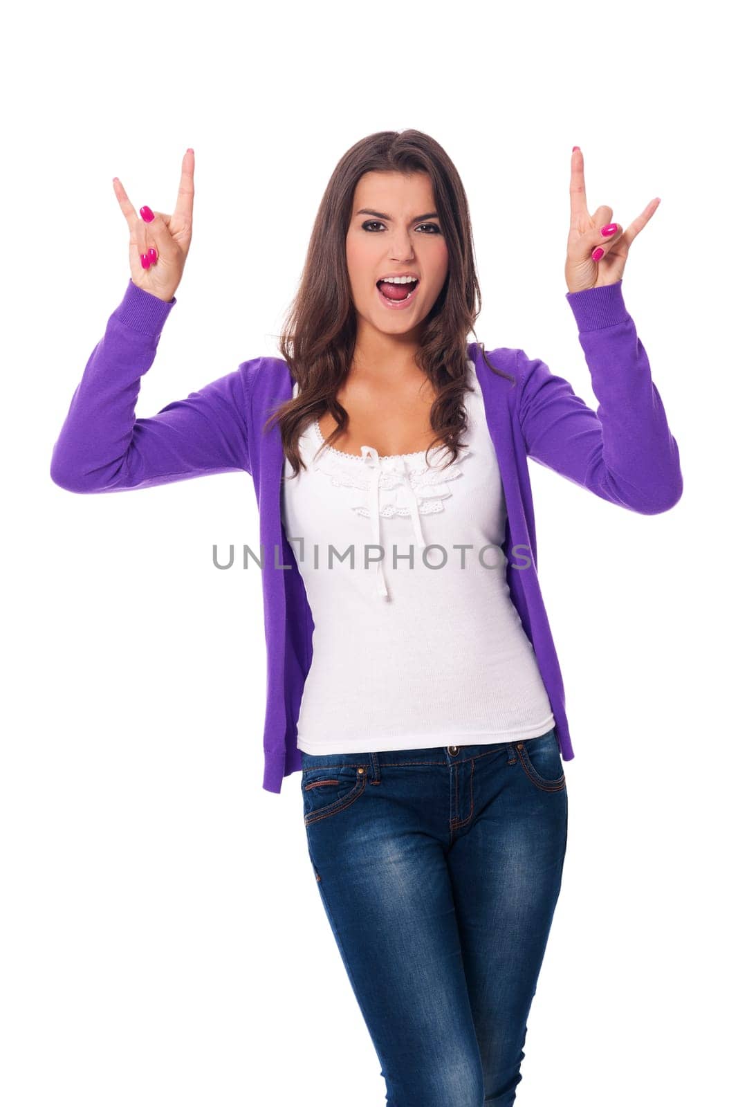 Young woman showing hard rock hand sign