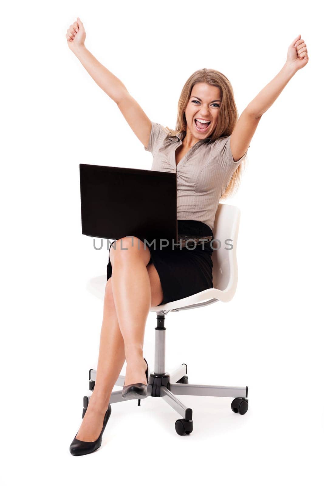 Successful businesswoman with laptop on knees