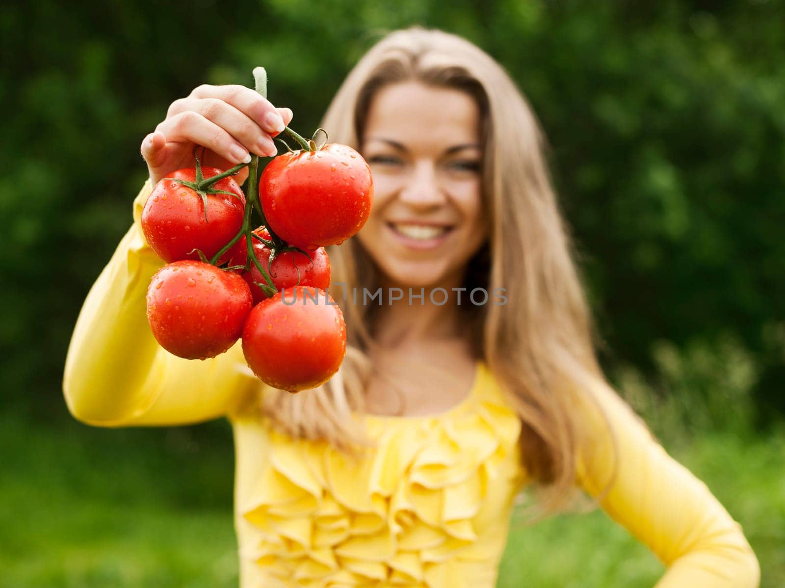 Woman with tomatoes