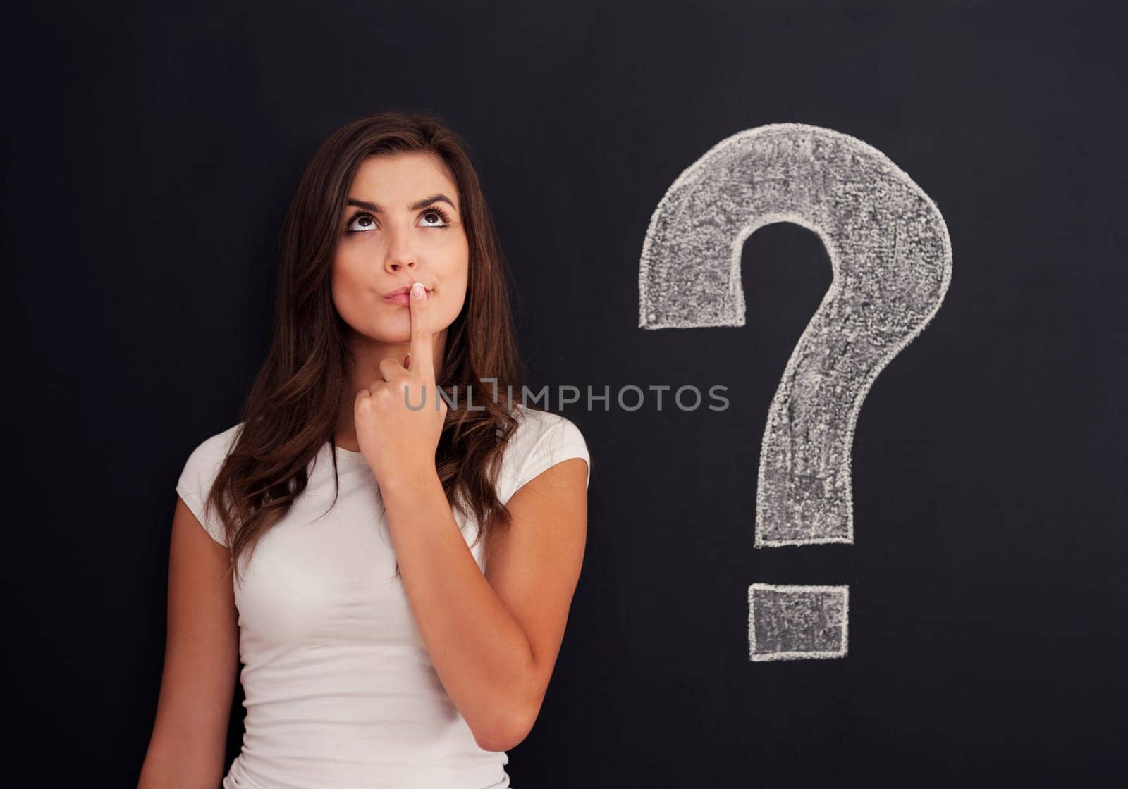 Woman with question mark on blackboard