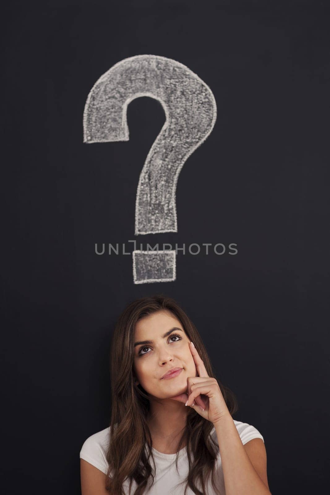 Big question mark on blackboard