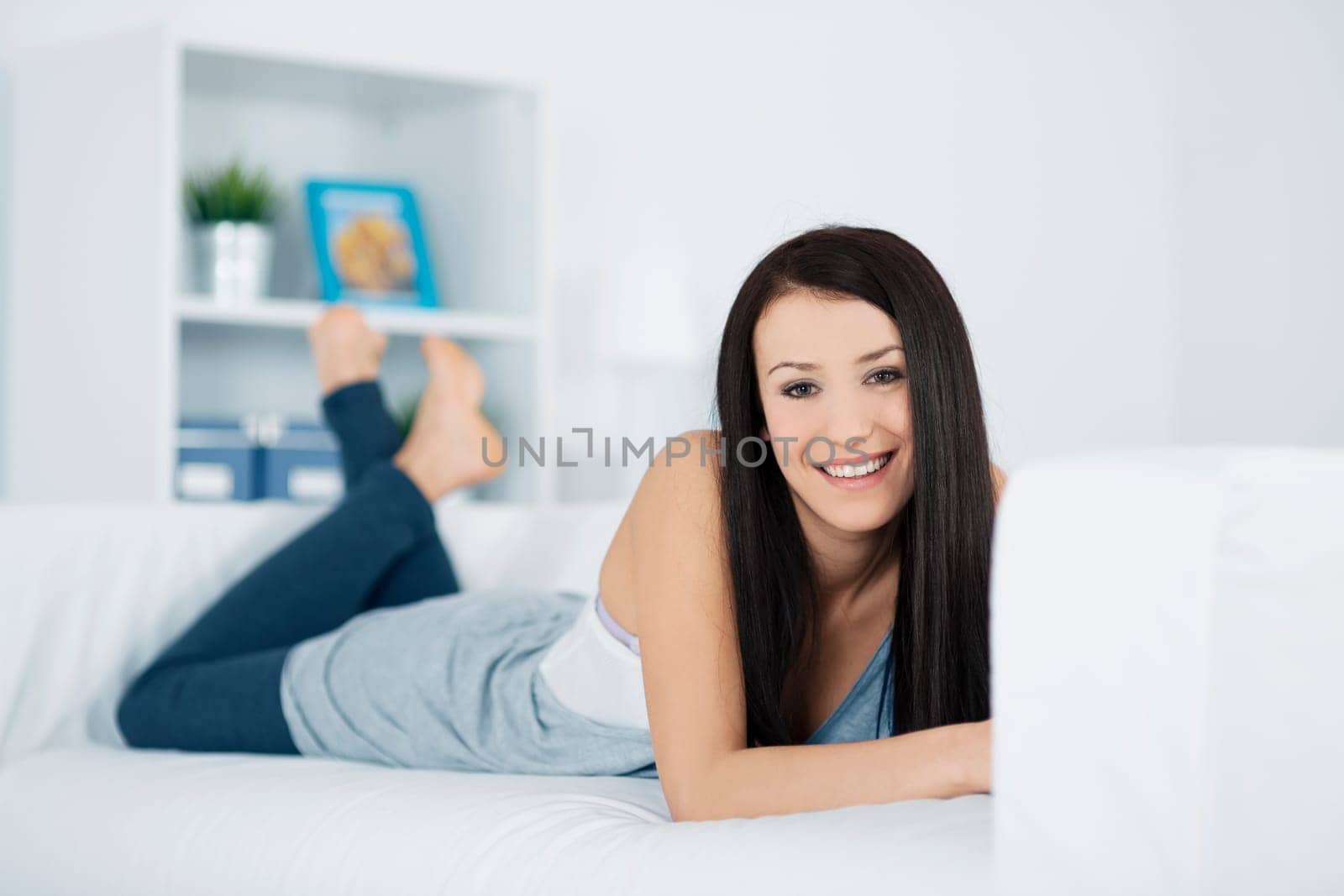Beautiful woman resting on couch