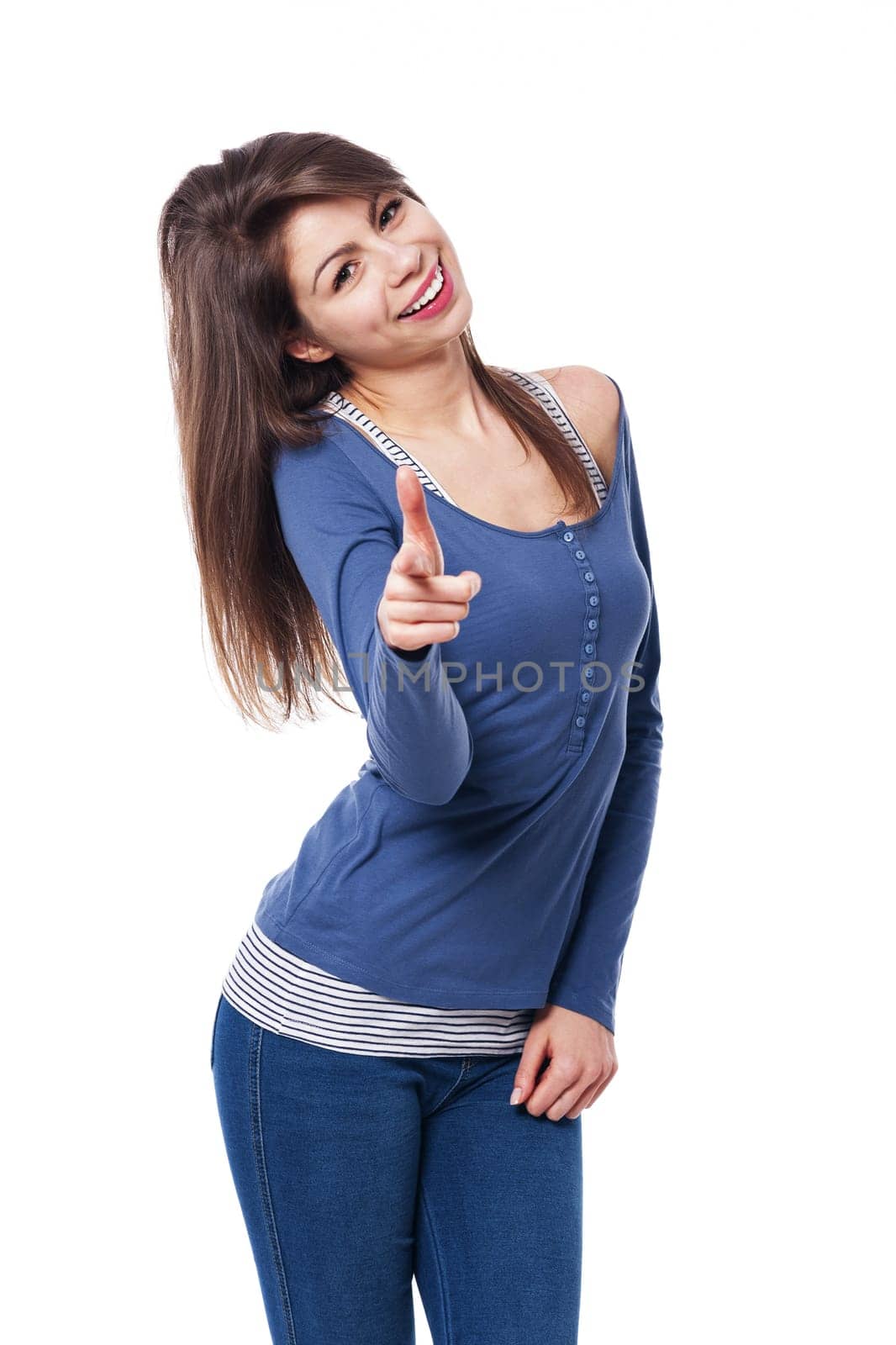Smiling woman pointing at camera