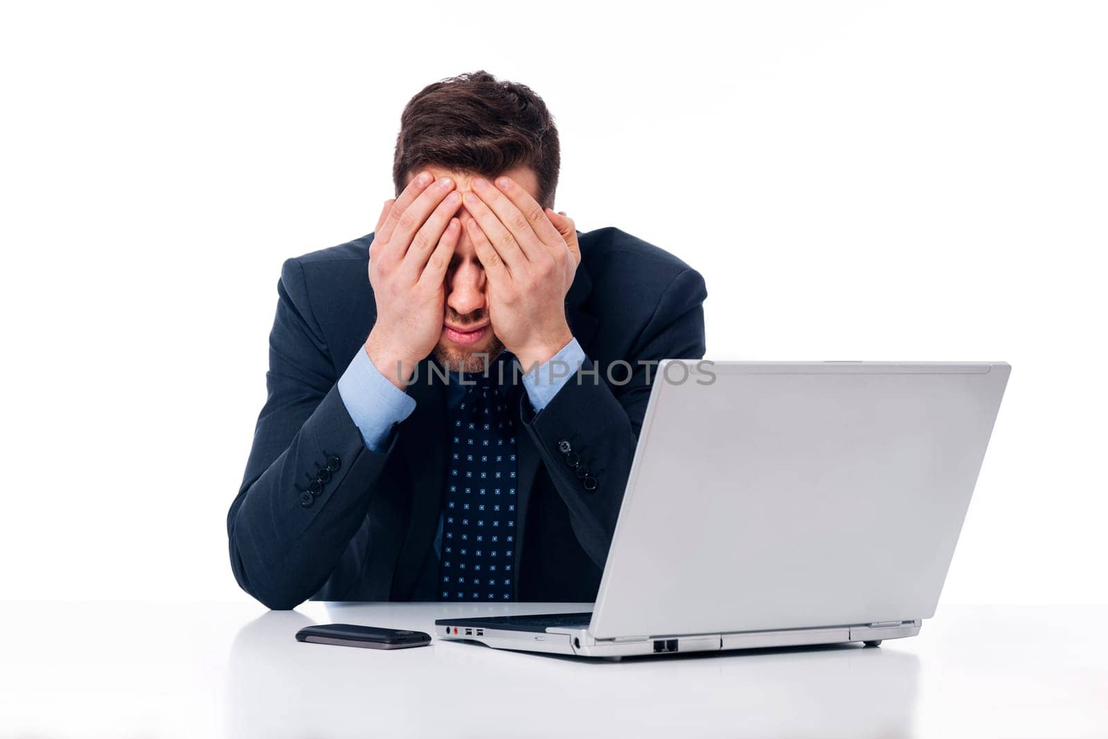 Tired businessman at work