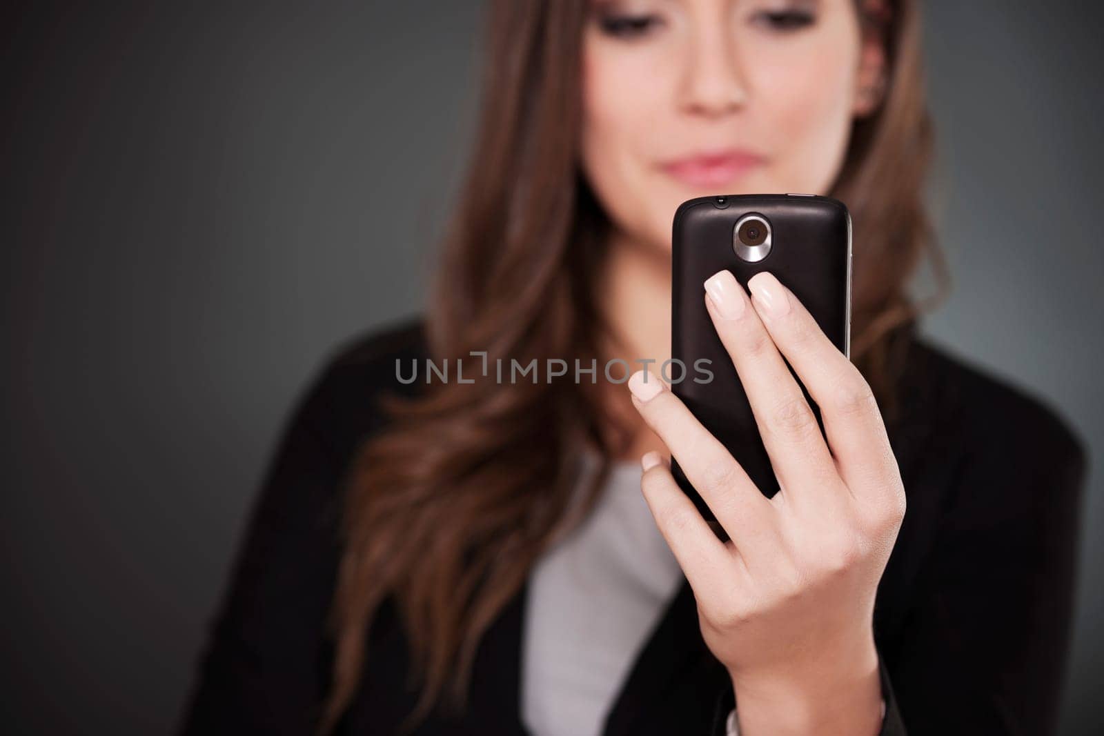 Young businesswoman using smart phone