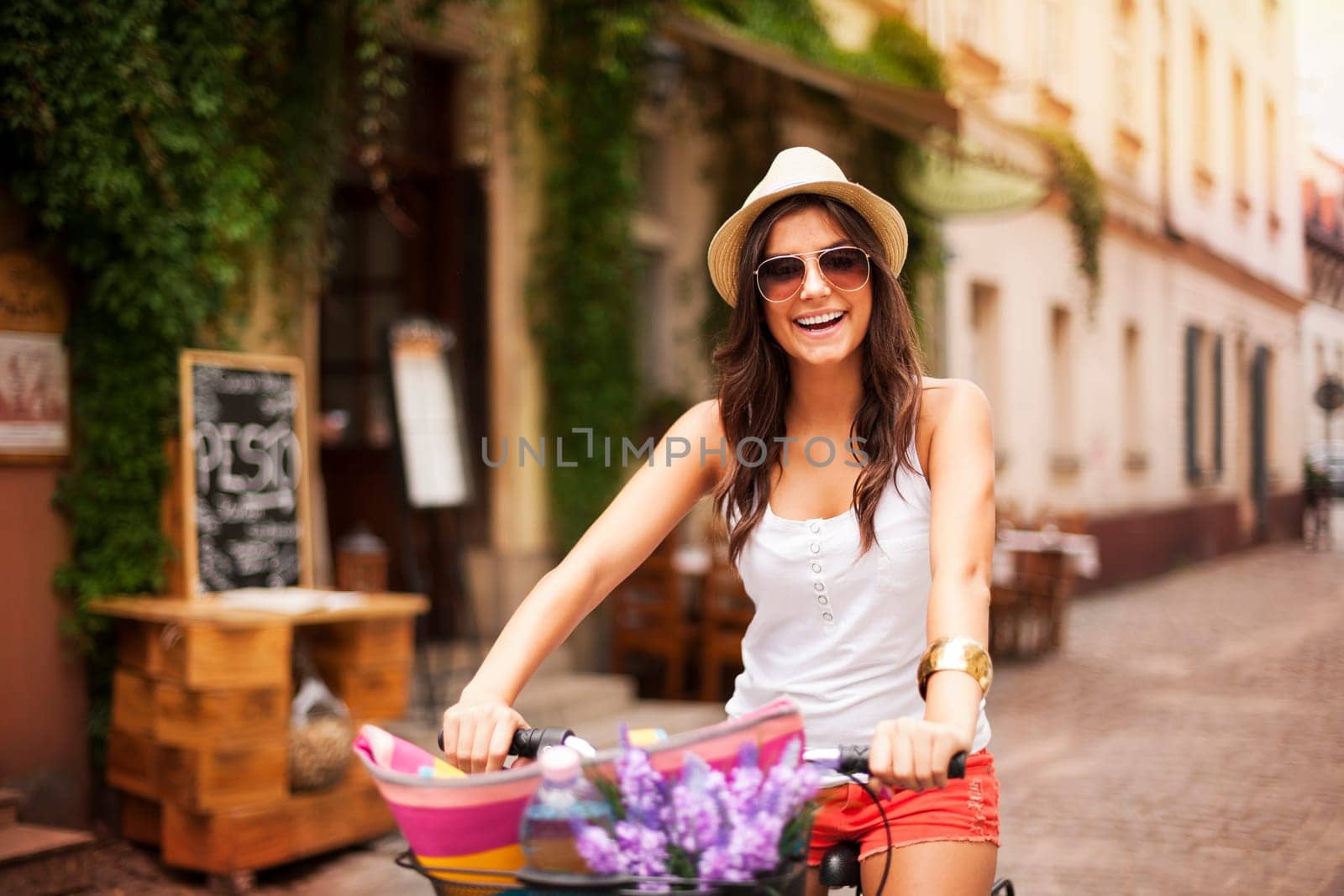 Beautiful woman riding on bike