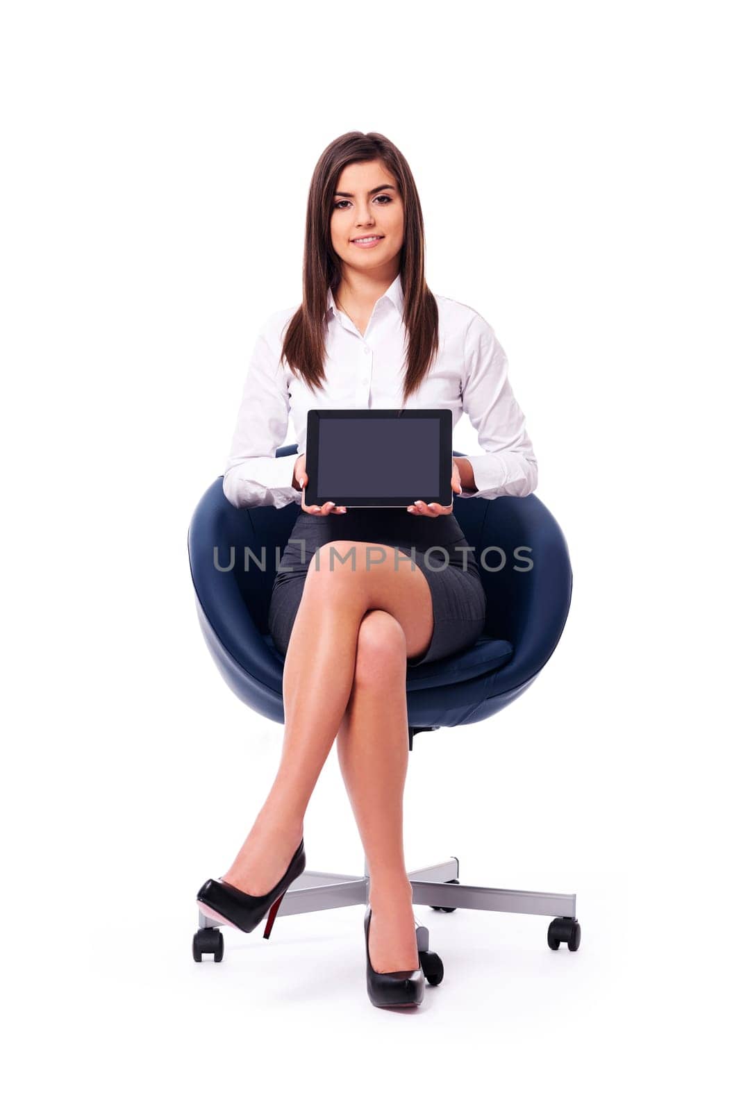 Sitting businesswoman holding a blank digital tablet with black screen