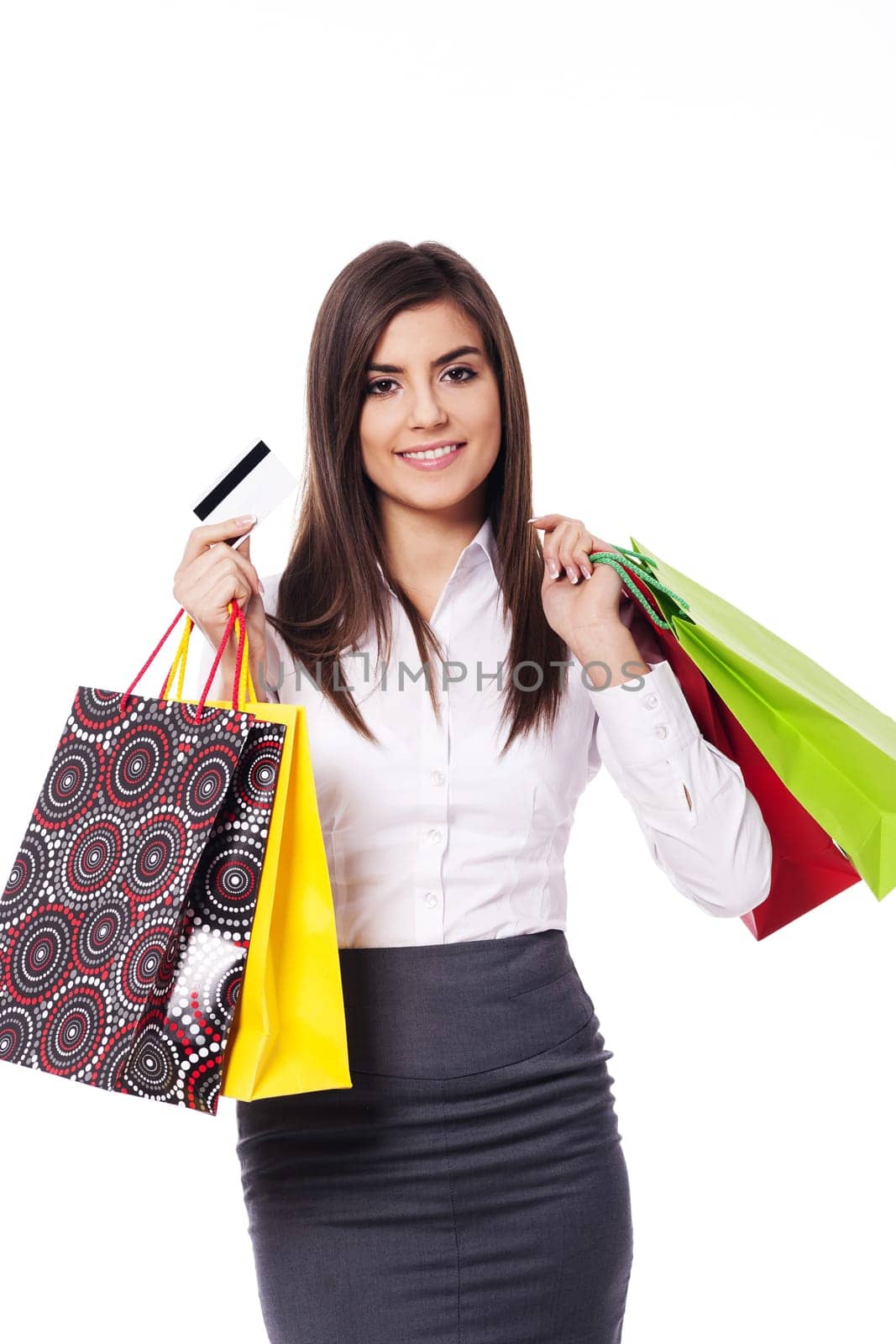 Businesswoman with shopping bag and credit card