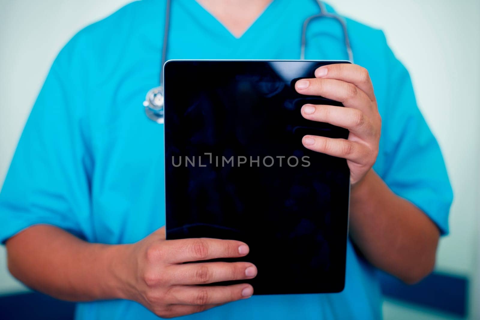 Doctor holding digital tablet