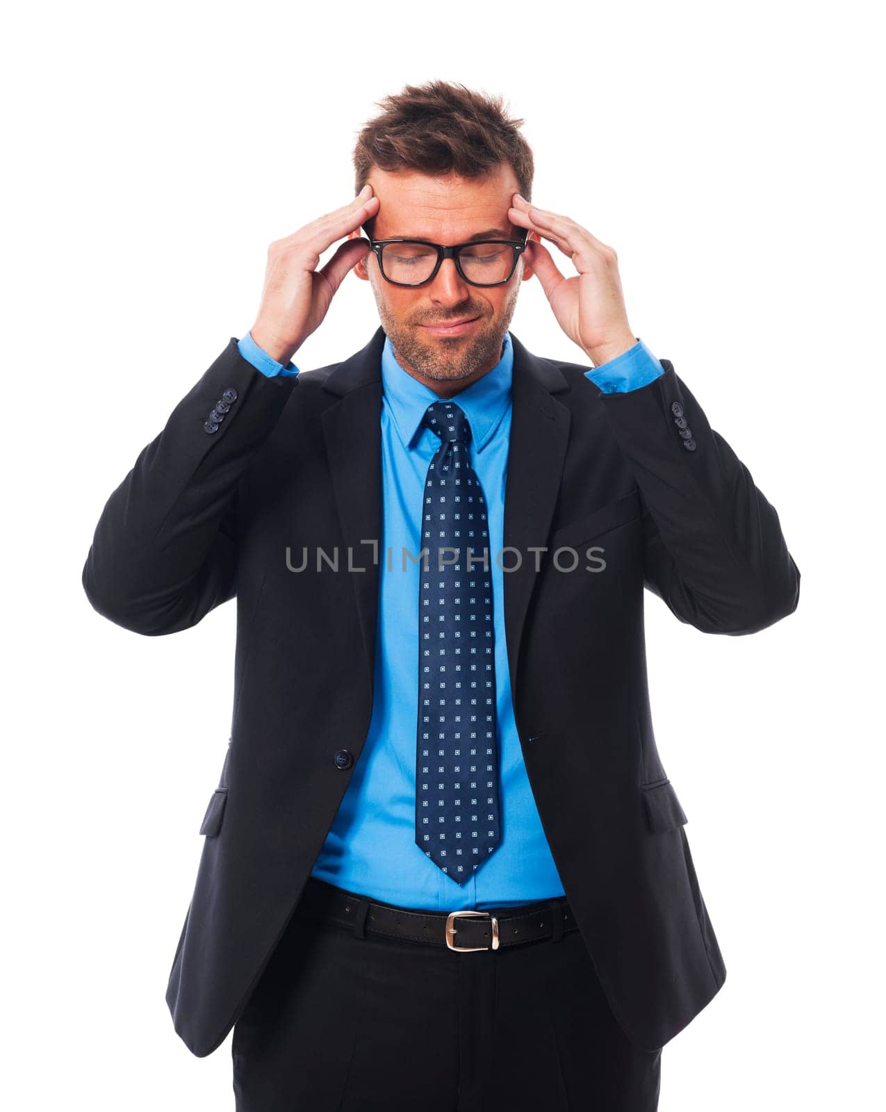 Businessman wearing glasses with awful headache