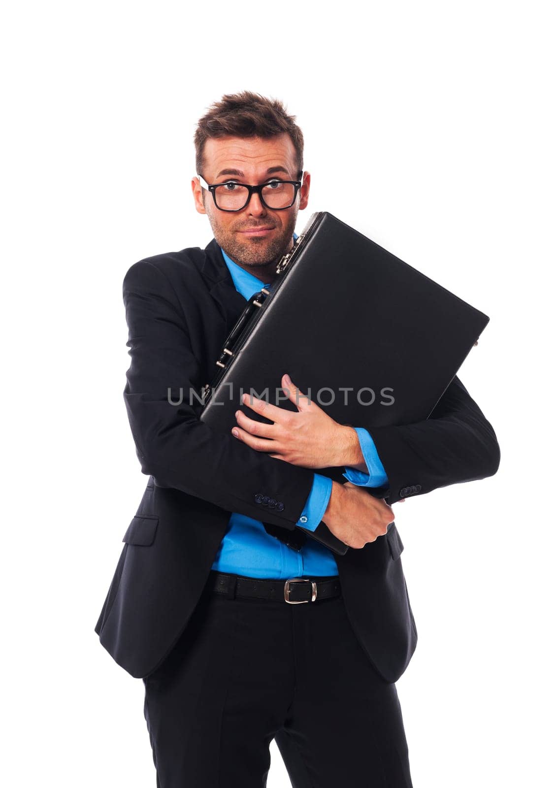 Frightened man firmly clutching his briefcase