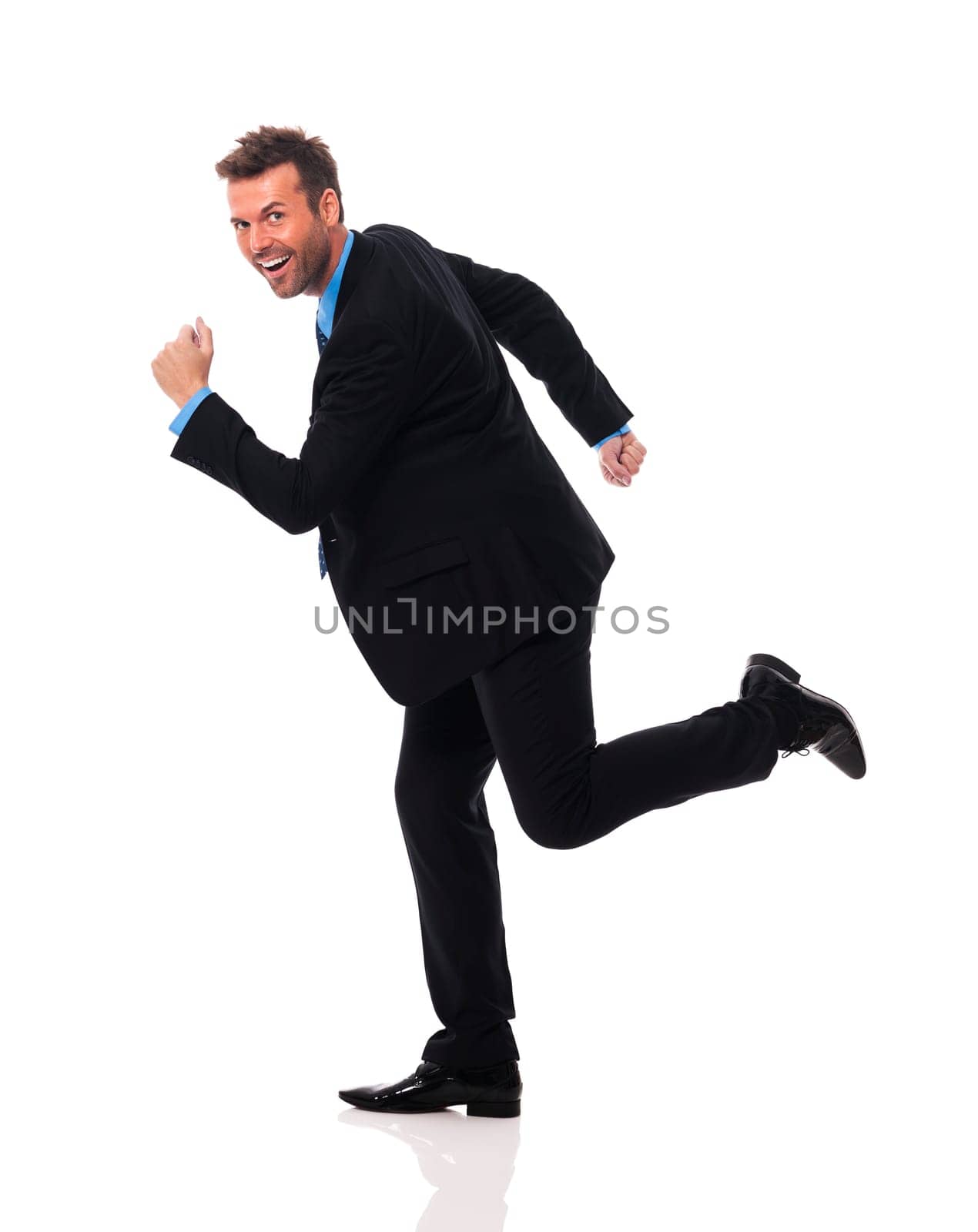 Handsome and smiling businessman hurry up