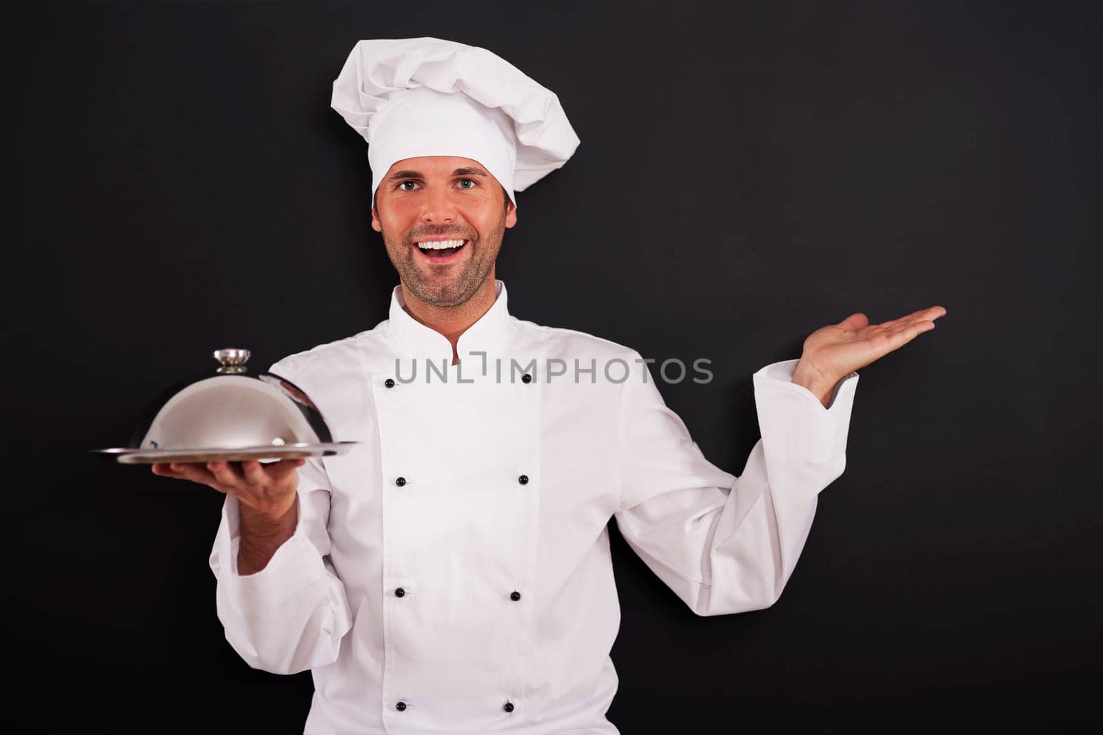 Smiling chef recommended main course