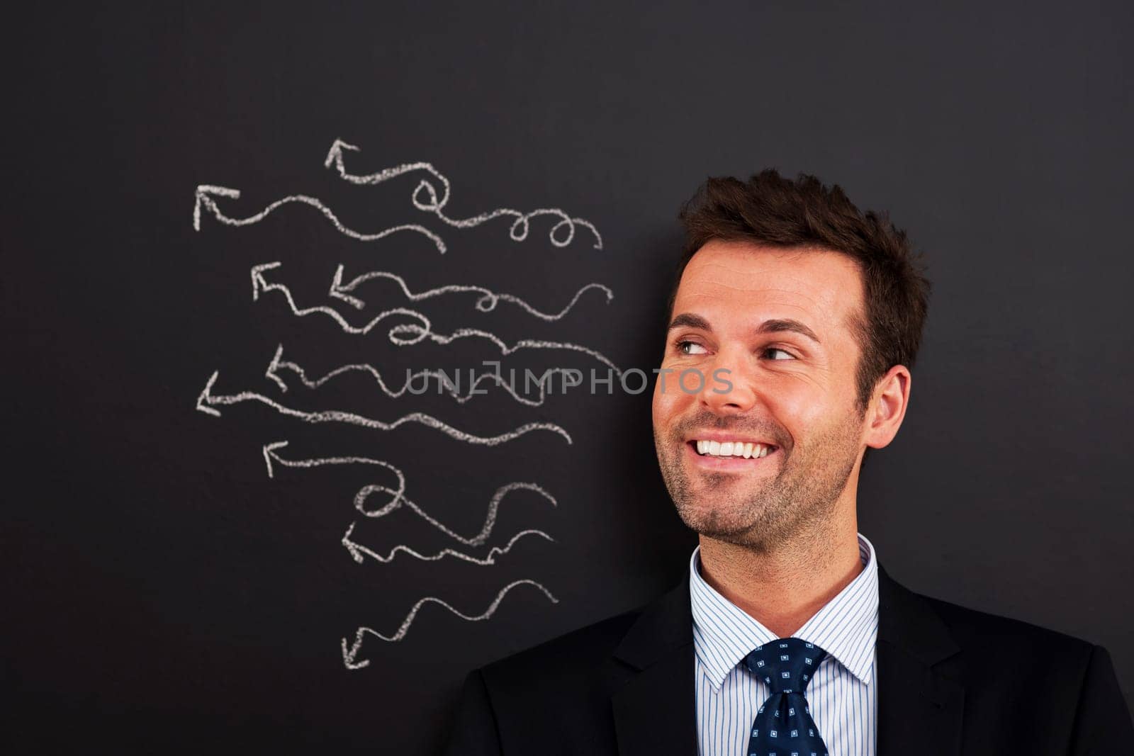 Smiling businessman have a lot of crazy ideas
