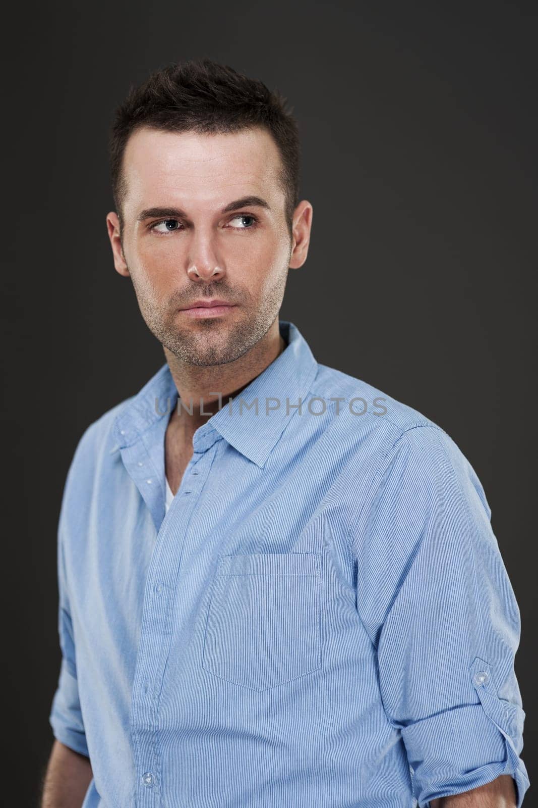 Portrait of handsome pensive man
