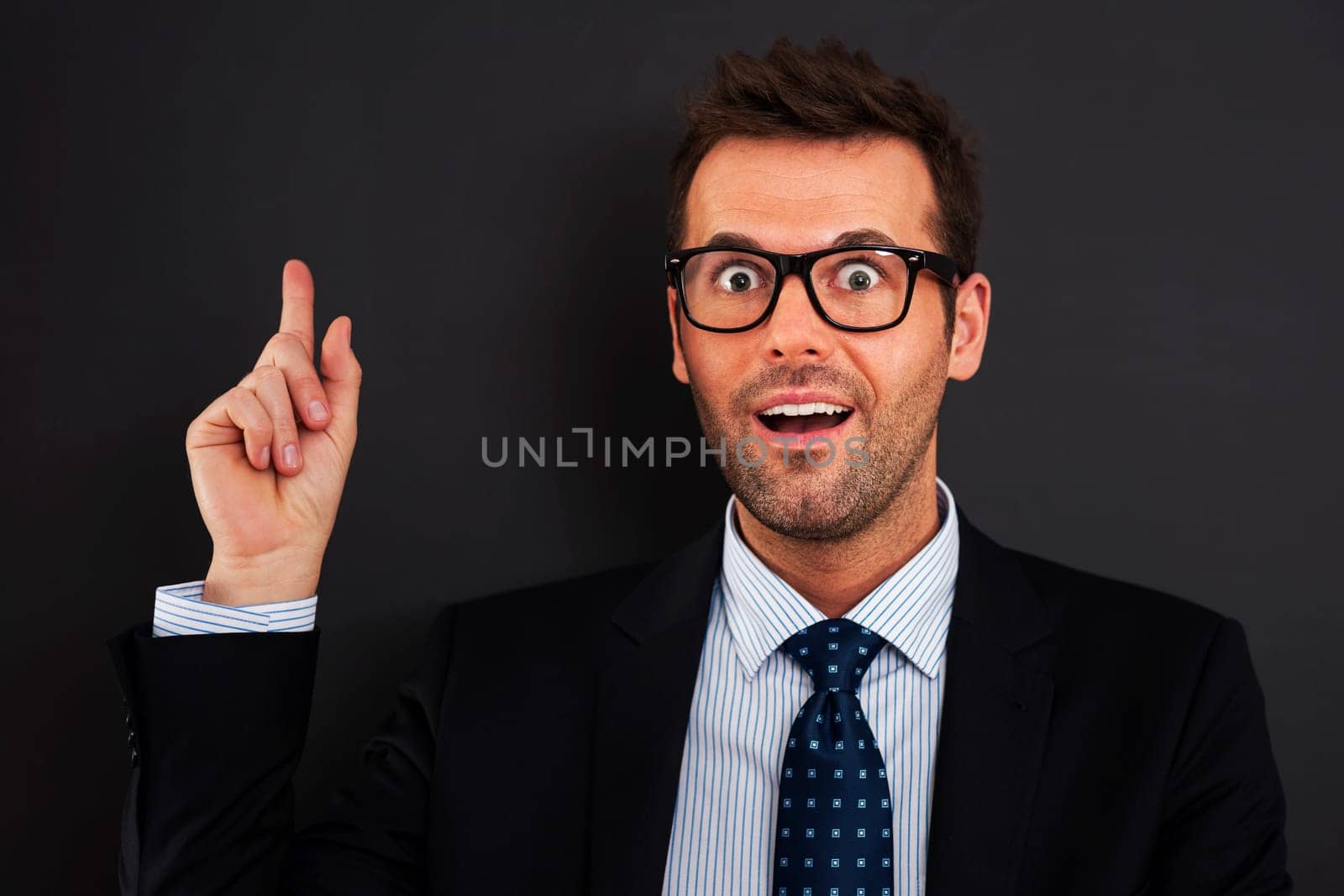 Handsome businessman have unexpected idea