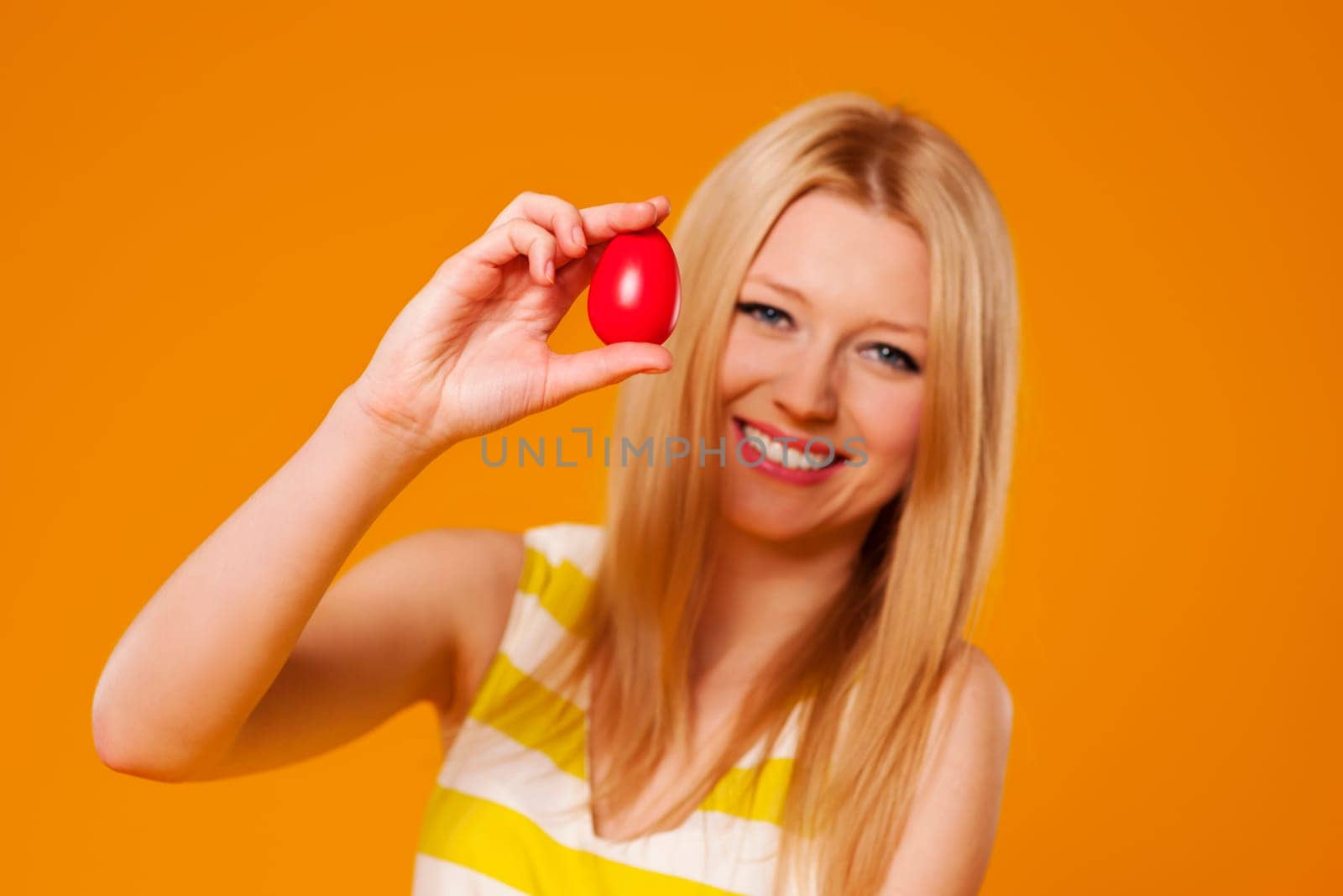 Woman with  red easter egg