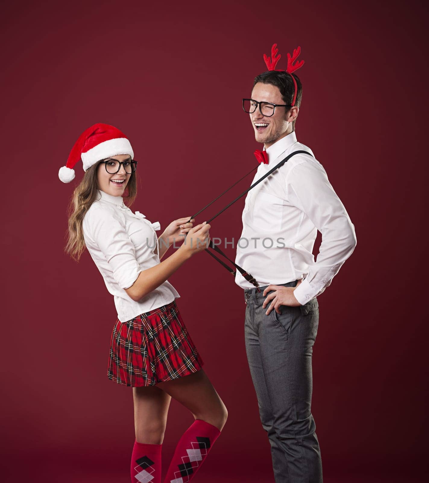 Cute couple flirting in christmas time