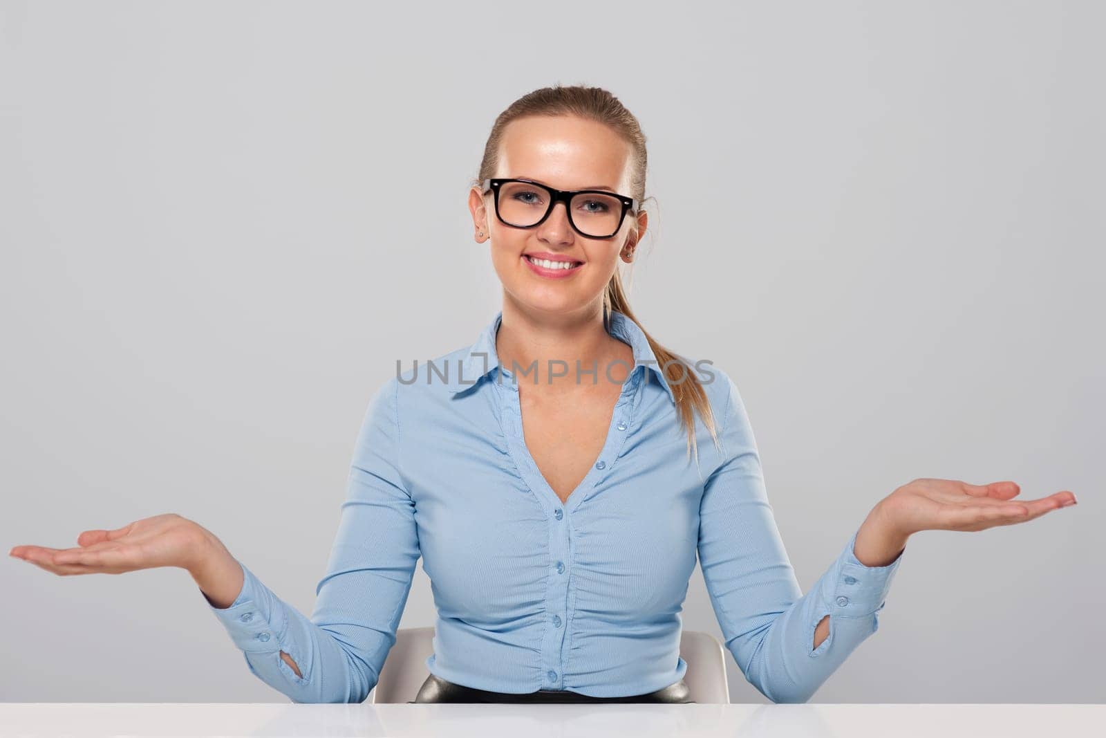 Confident businesswoman welcome gesture