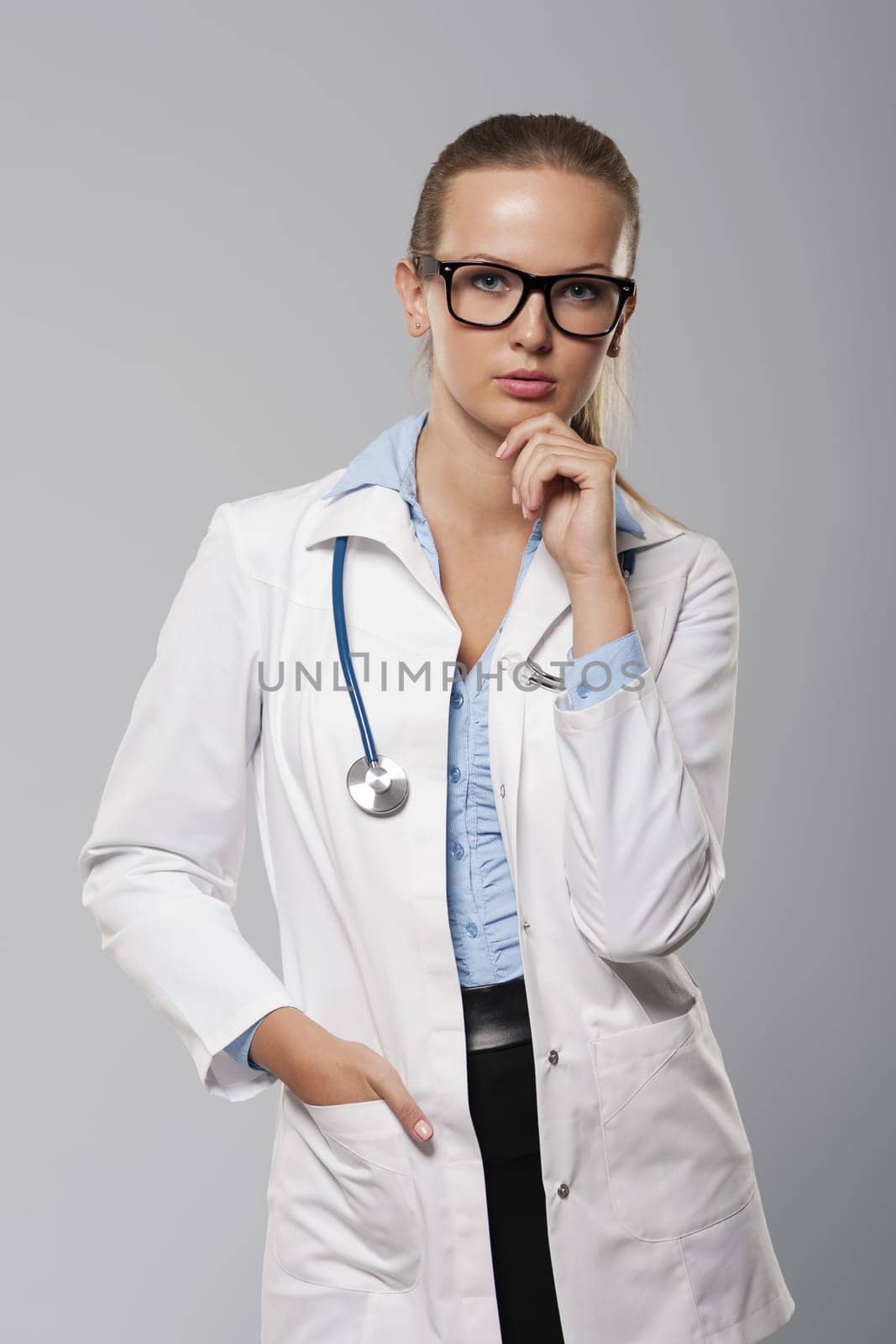 Portrait of serious female doctor
