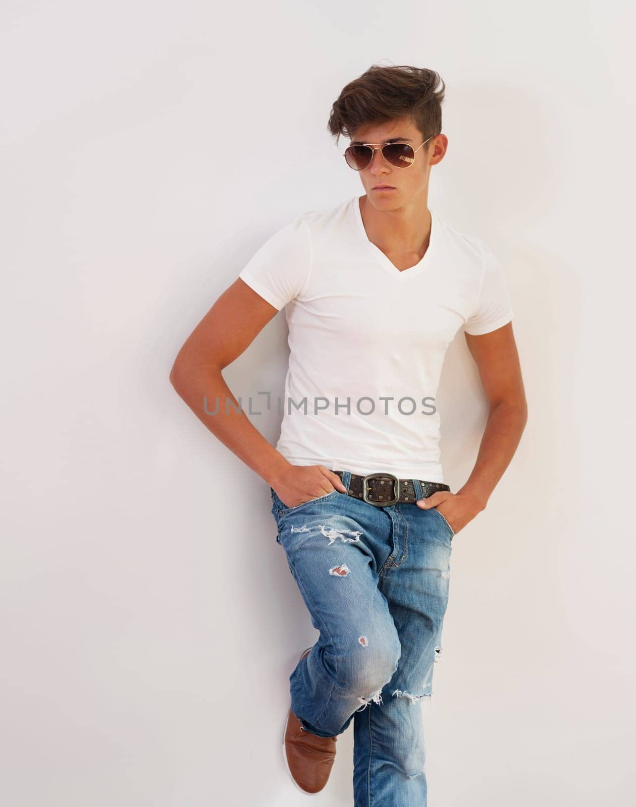 Portrait of handsome young man wearing sunglasses