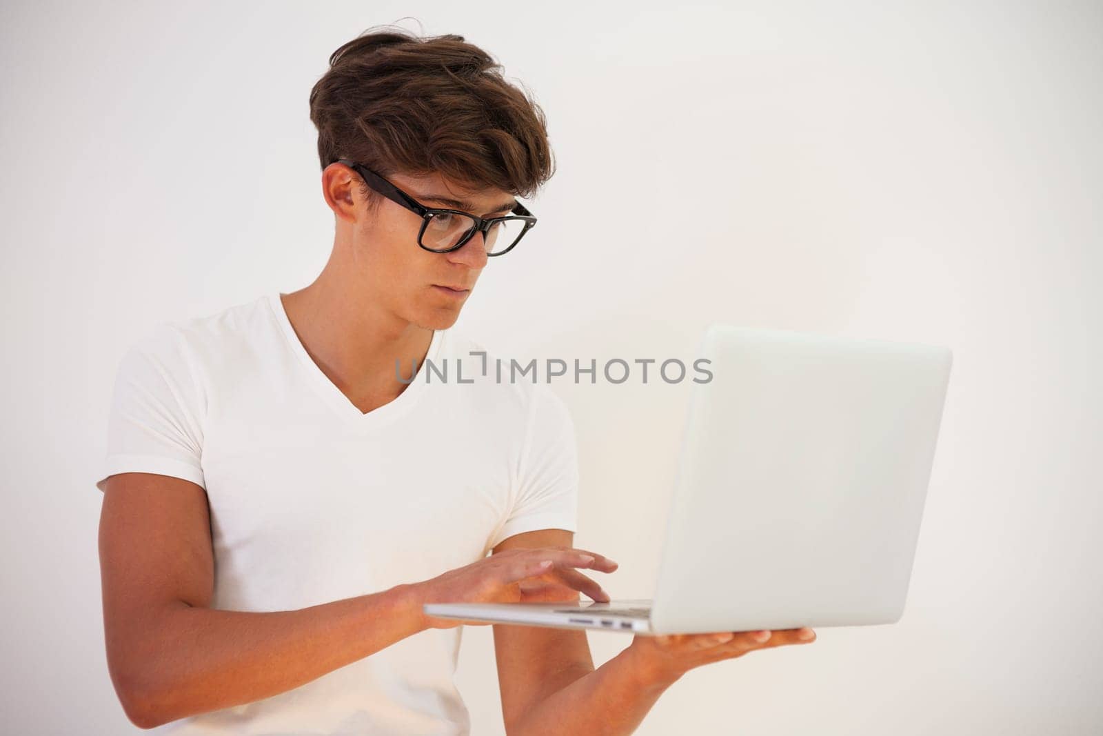 Handsome young man using computer