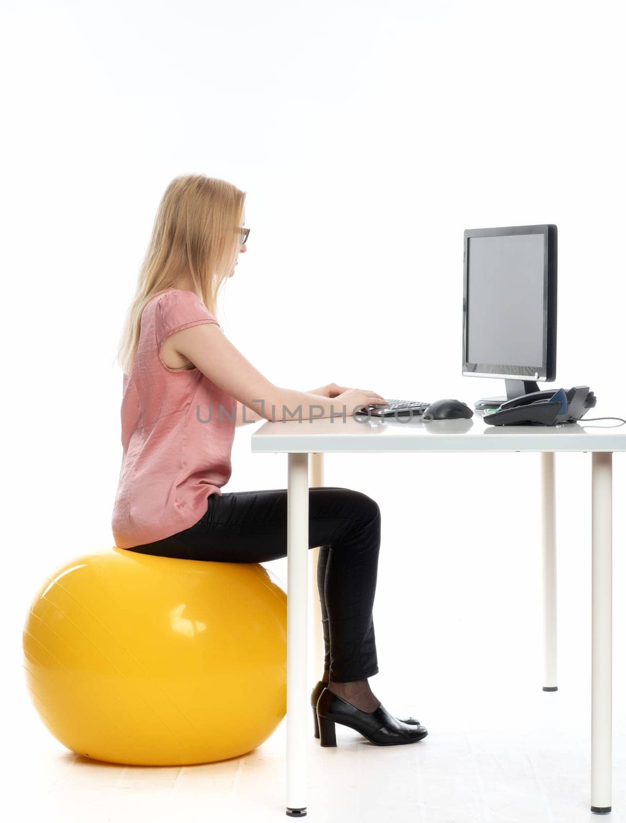 Businesswoman on a seat ball