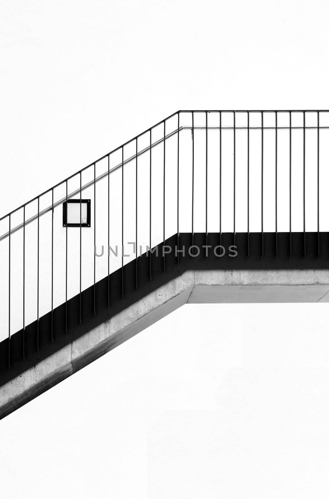Photographing a modern staircase with a stainless steel railing