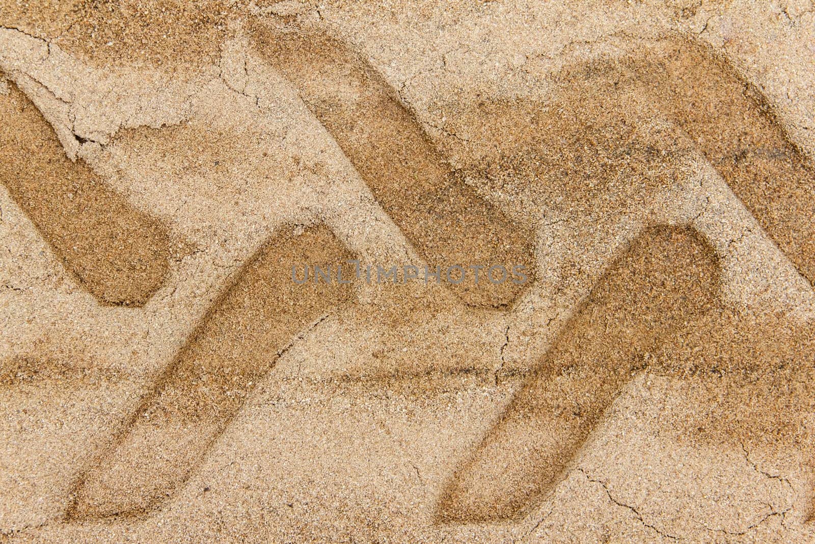 Wheel track on sand ground