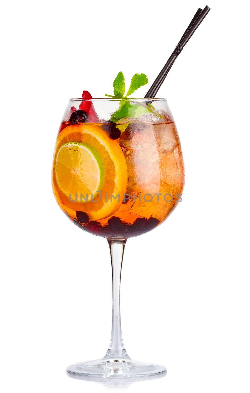 Alcohol cocktail with fresh mint and fruits isolated on white background