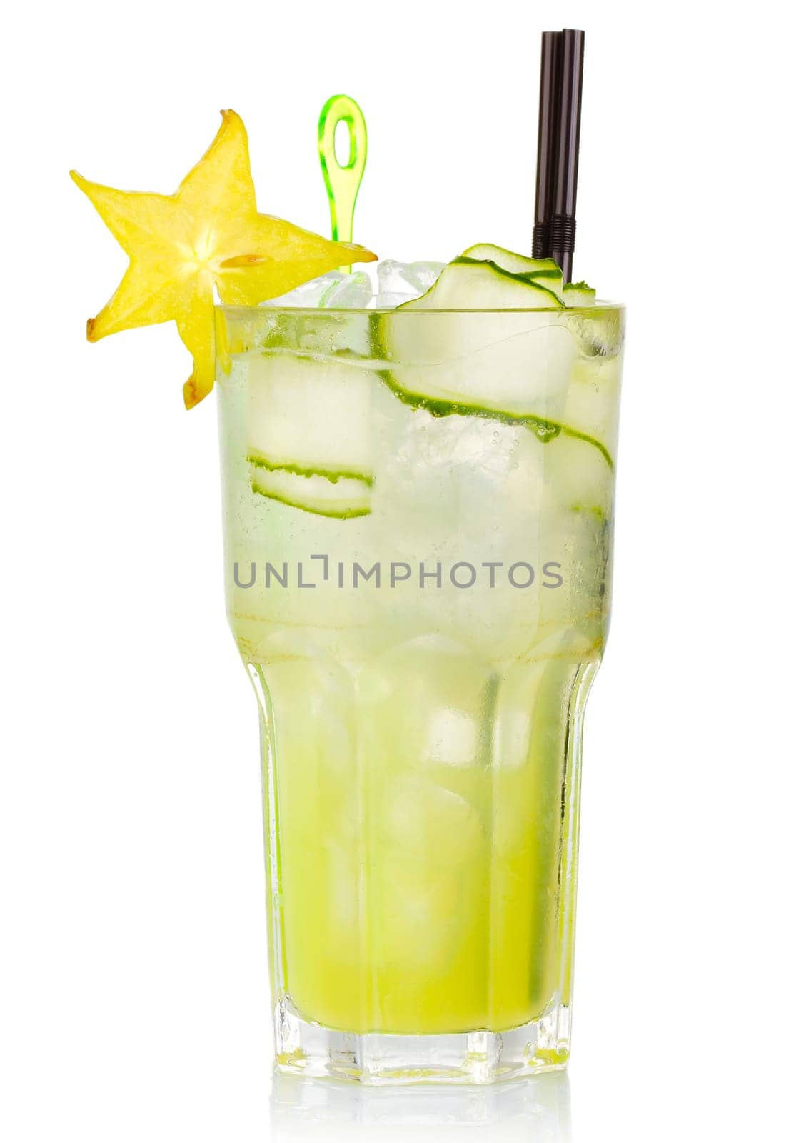 Green alcohol cocktail with carabola fruit isolated on white background