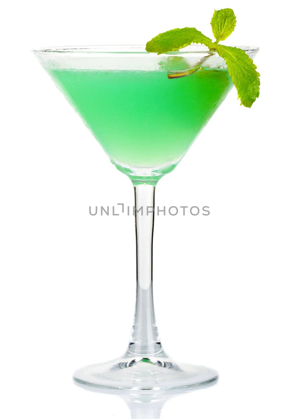 Green alcohol cocktail with fresh mint leaves isolated on white background