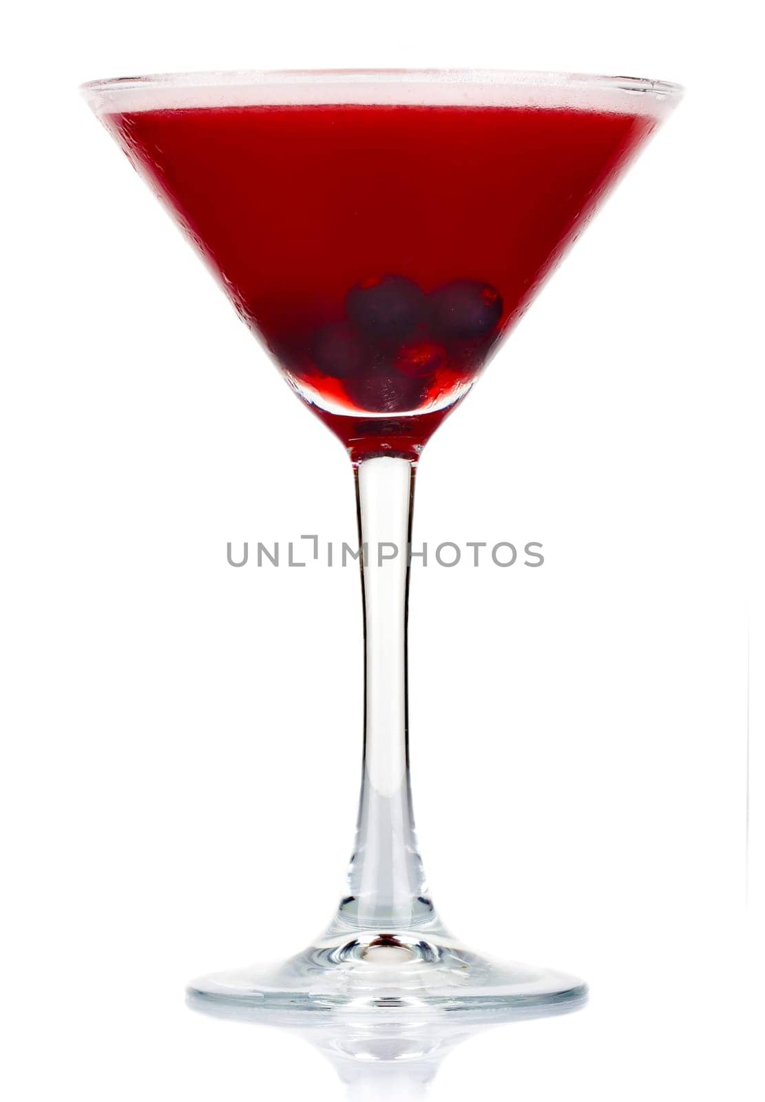 Sliced alcohol cocktail with currant berry isolated on white background