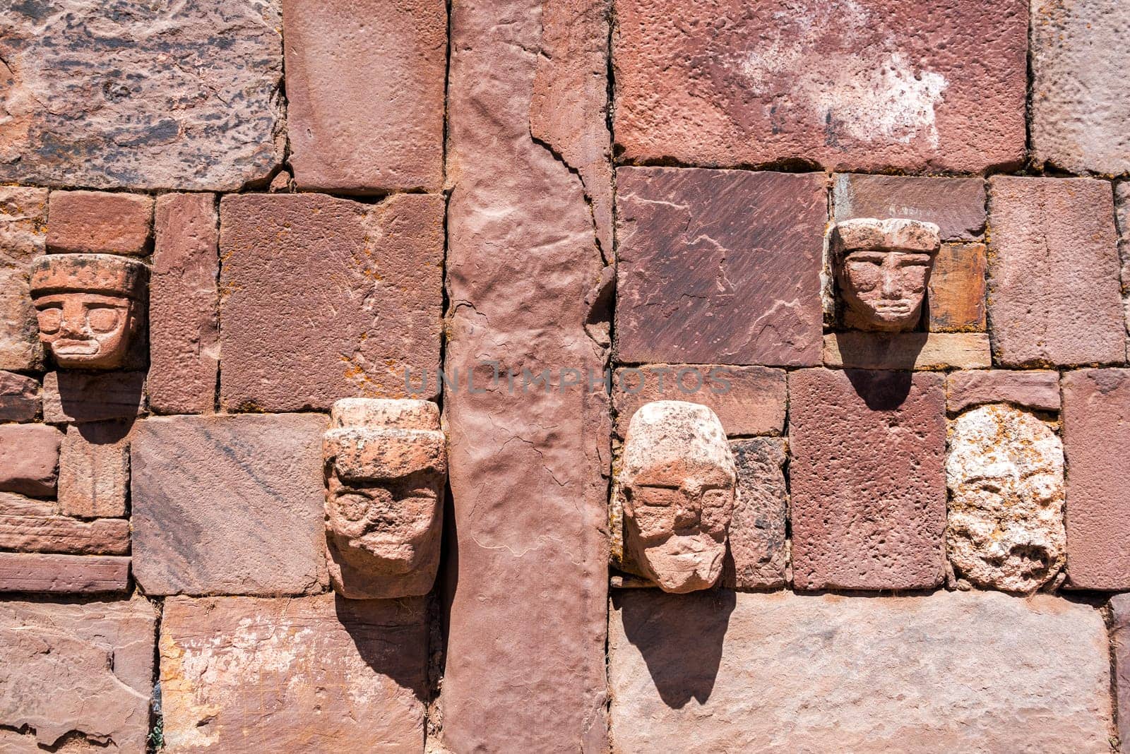 Faces on a wall in the semi-subterranean temple in Tiwanaku near La Paz, Bolivia