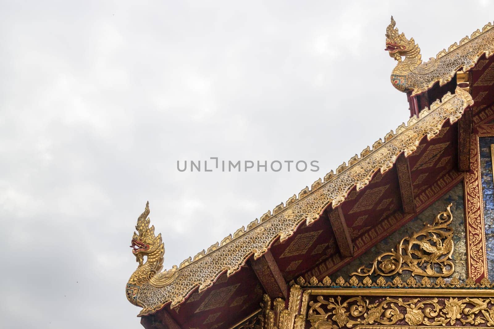 Element of thai art on roof at phra singha temple in Chiang Mai, Thailand is a public place