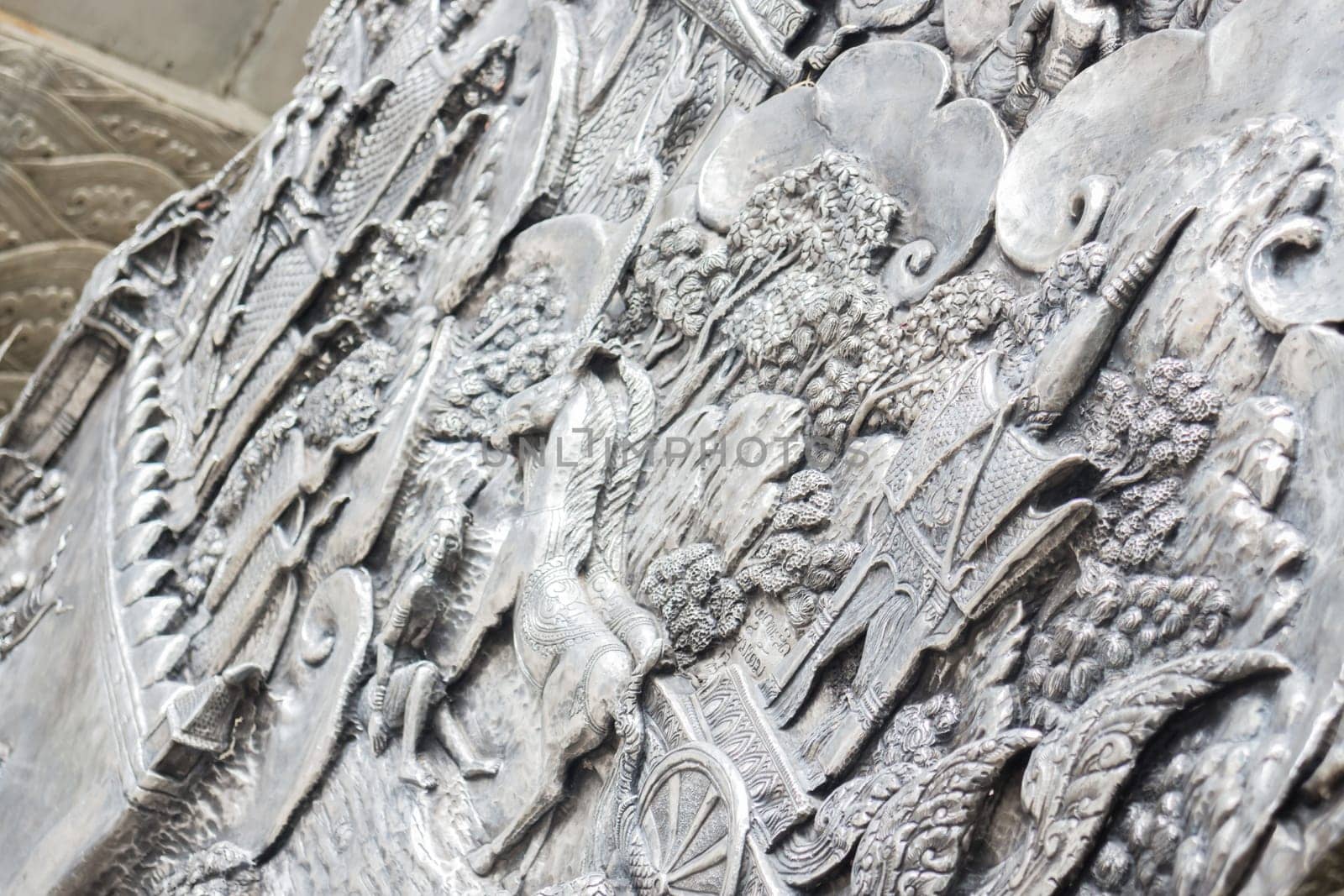 Frame engraving silver lacquer plate in temple is a public place