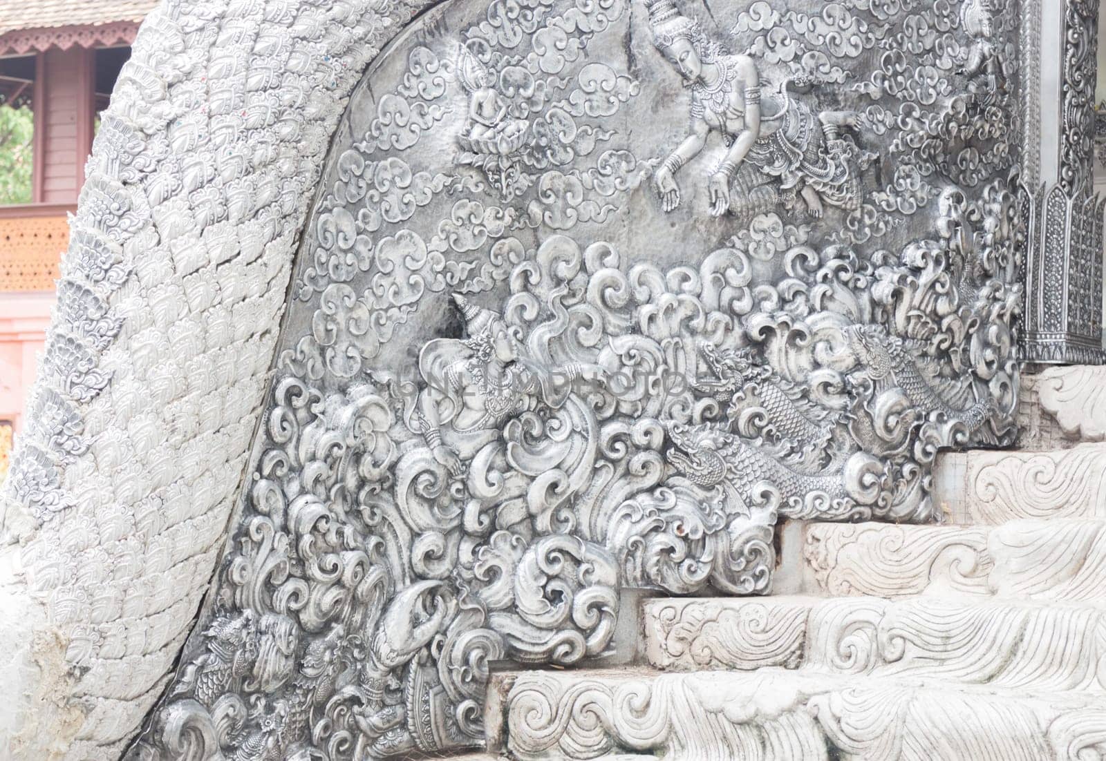 Beautiful wall of cement handicraft in temple is a public place