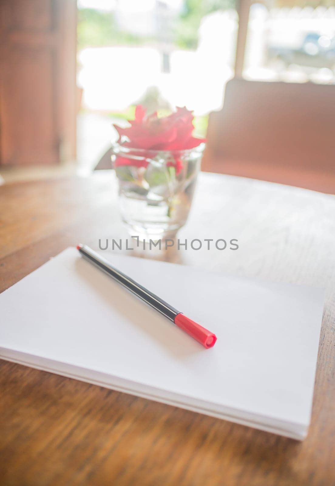 Romantic work table with rose, stock photo