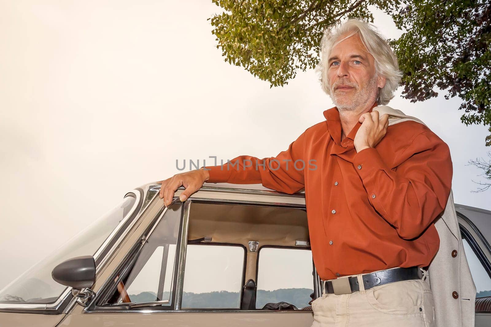 An image of a man in suit outdoor