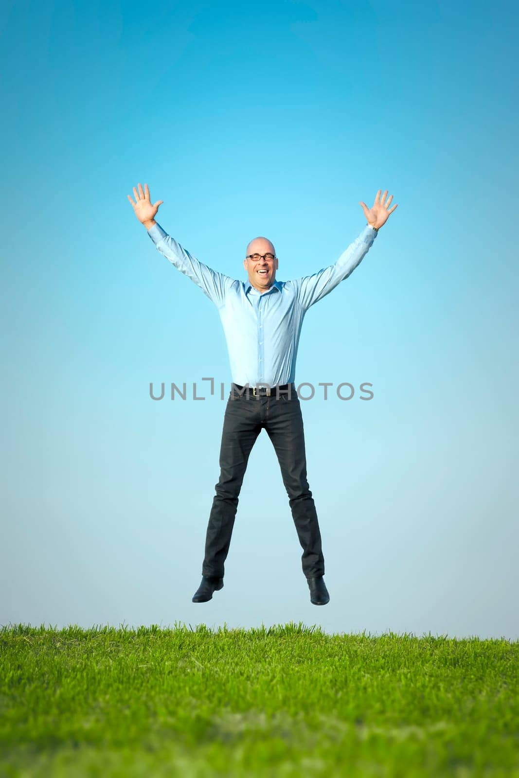 An image of a happy jumping man
