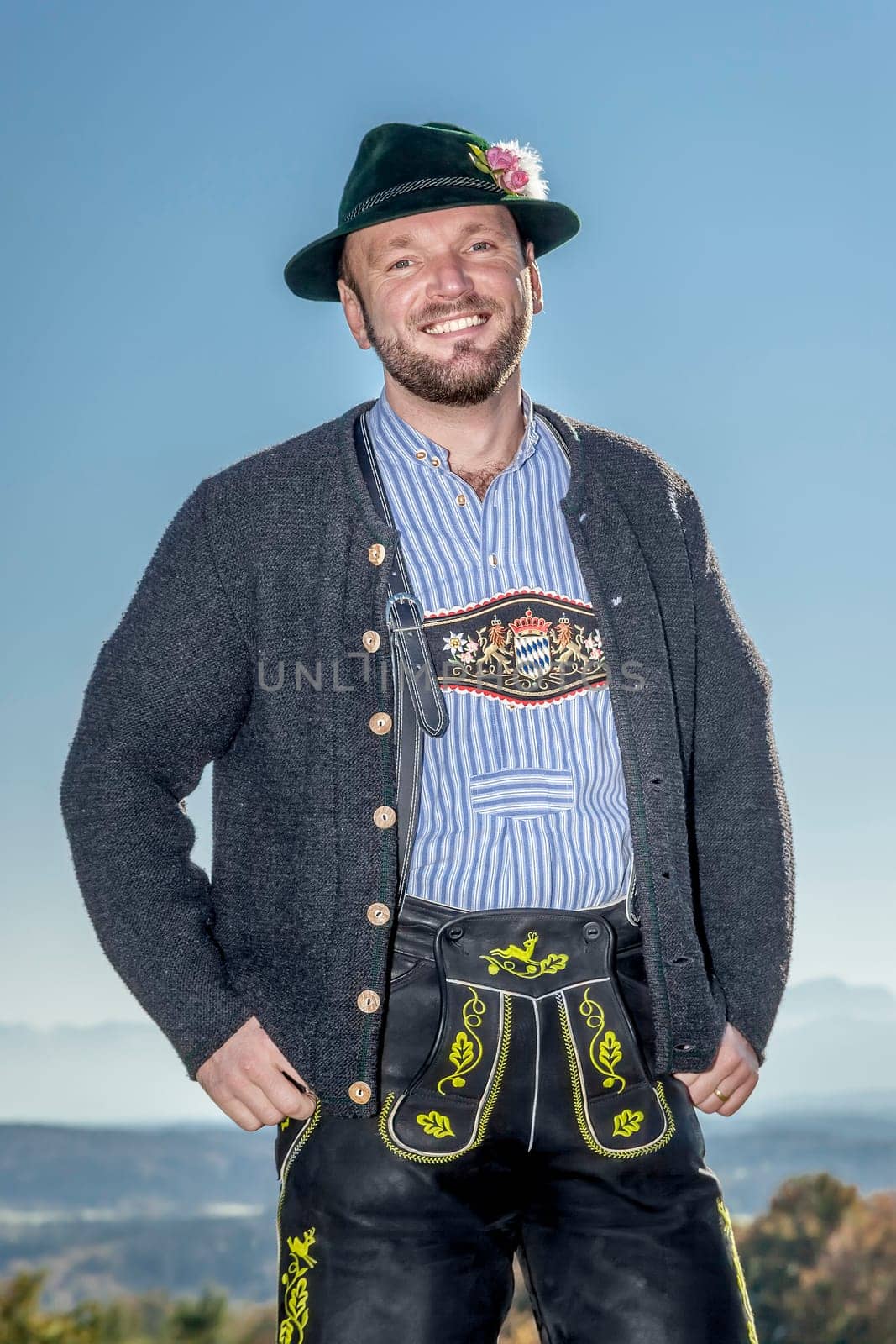 A traditional bavarian man in the autumn nature